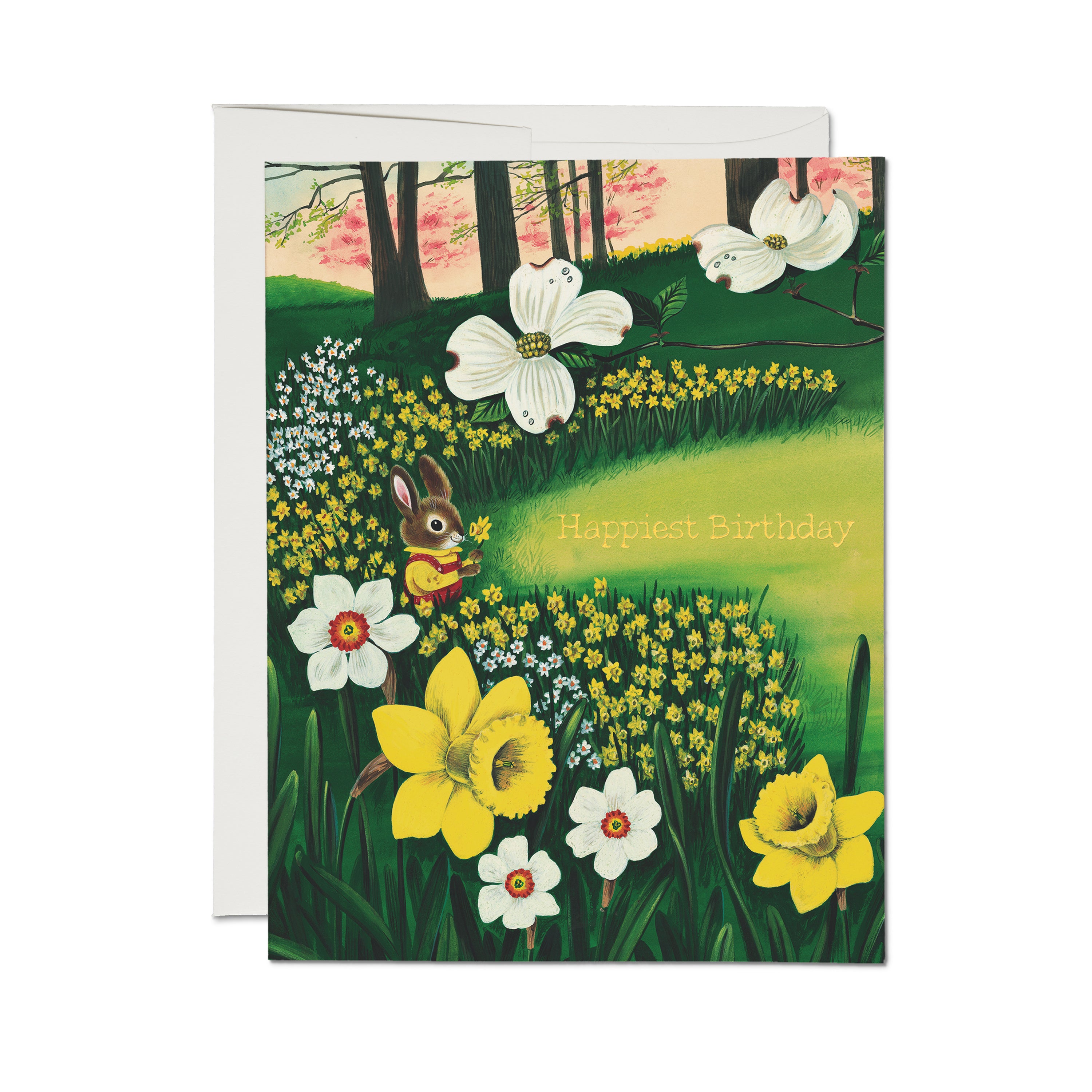 Birthday card with a rabbit holding a flower among daffodils, trees and spring blooms, with gold text 'Happiest Birthday.
