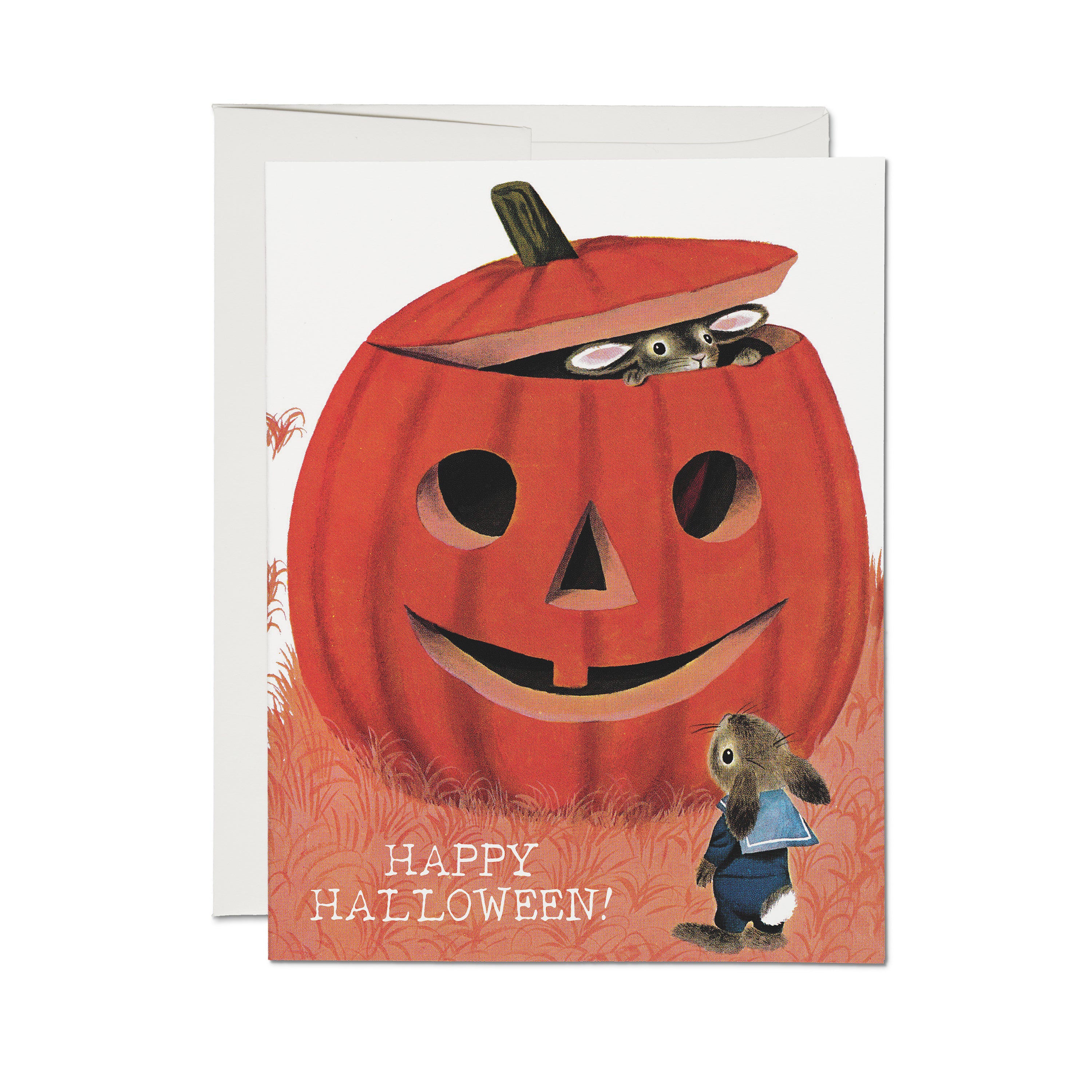 Halloween-themed card with two bunnies playing in a jack-o-lantern with text "Happy Halloween!"