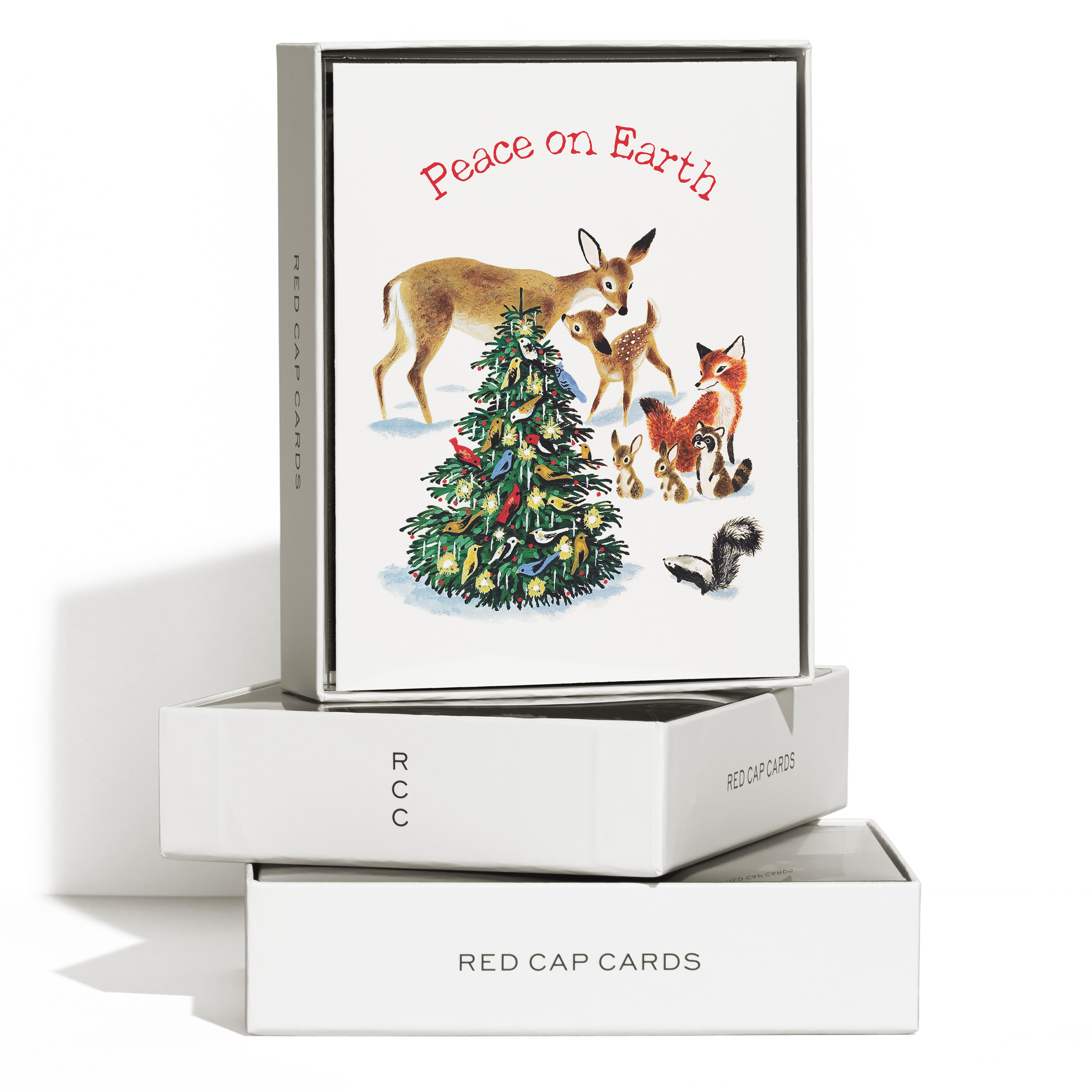 Christmas card with woodland animals around a decorated tree and 'Peace on Earth' text on white background Boxed Set of 8. 