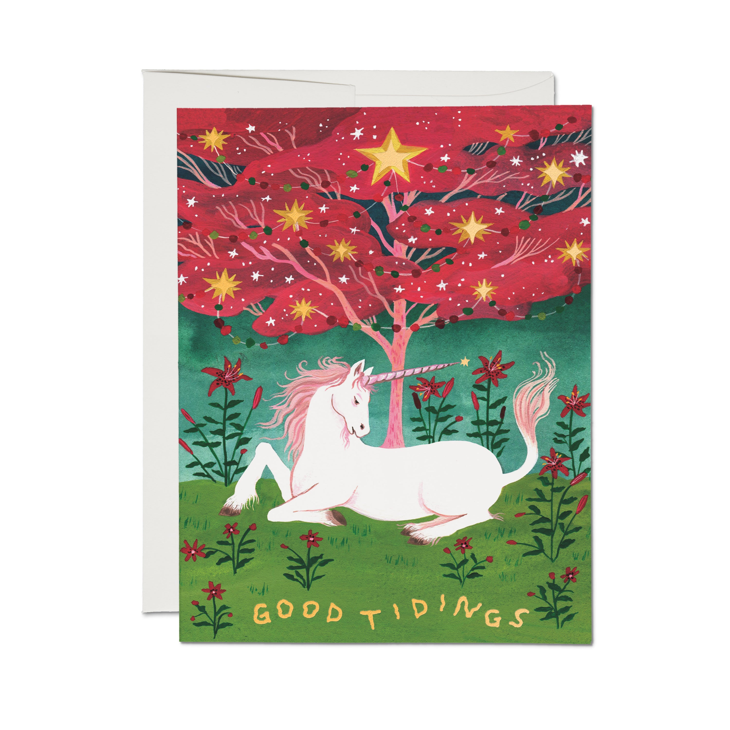 Greeting card with a unicorn under a red and pink tree with stars on a grassy field with red flowers and "Good Tidings" text.