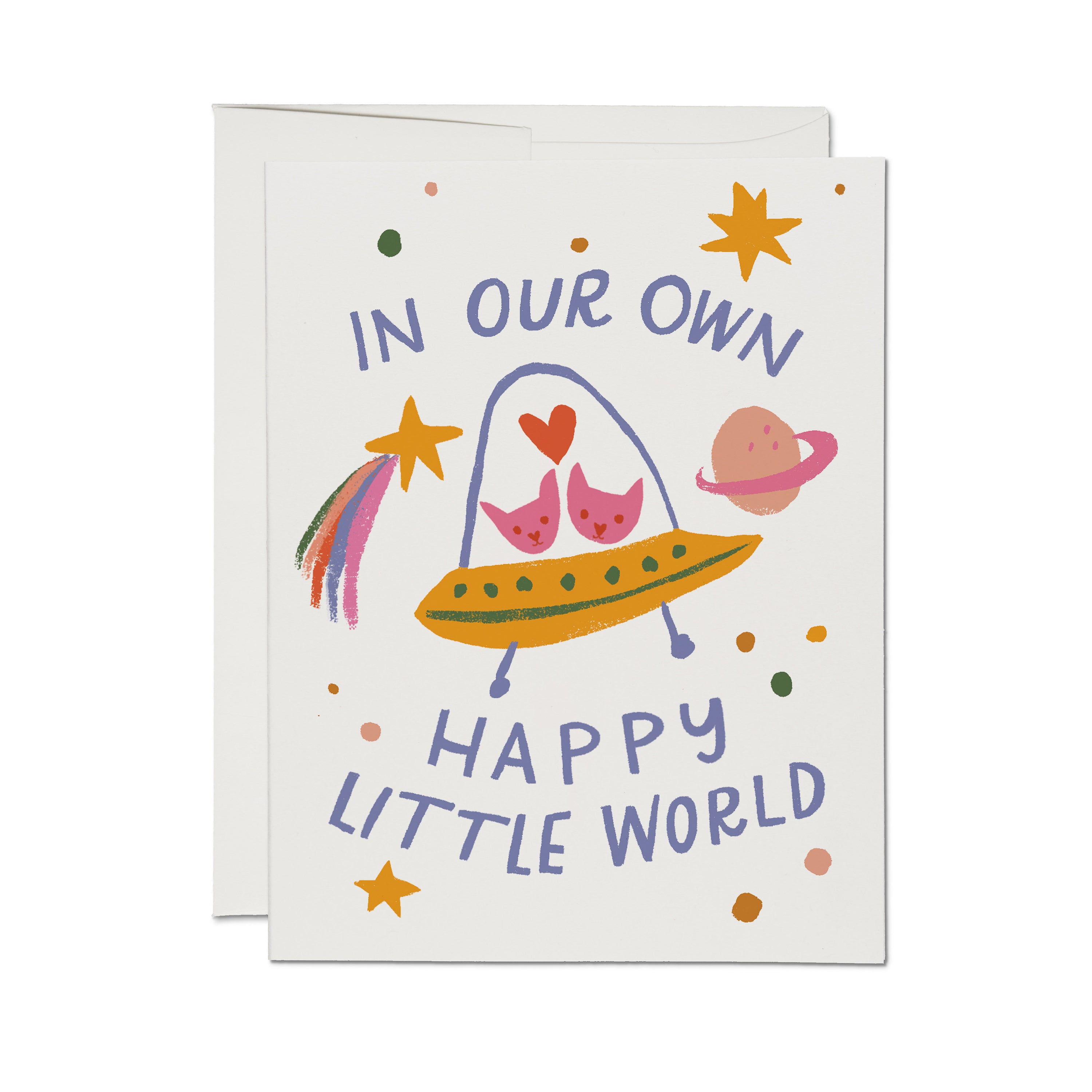 "In Our Own Happy Little World" with two kitties in a spaceship with an outer space design on white background.