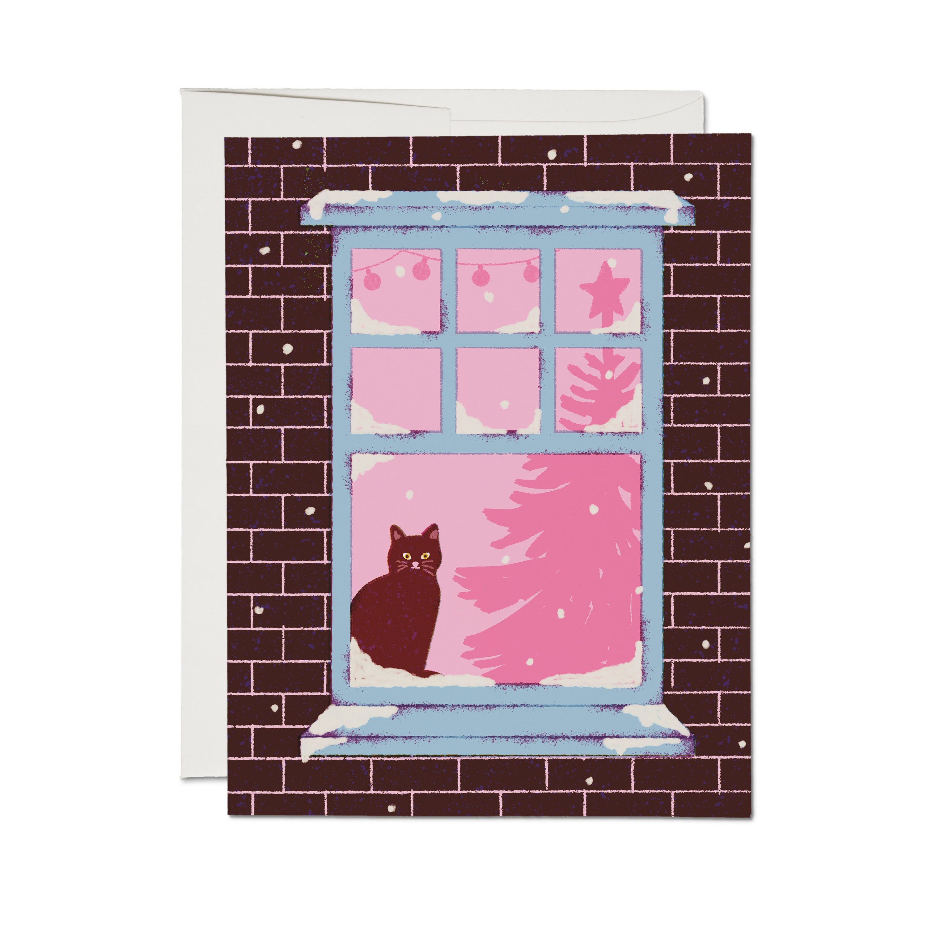 Christmas card with an illustrated cat sitting windowsill of a brick building with Christmas tree and lights in the background.