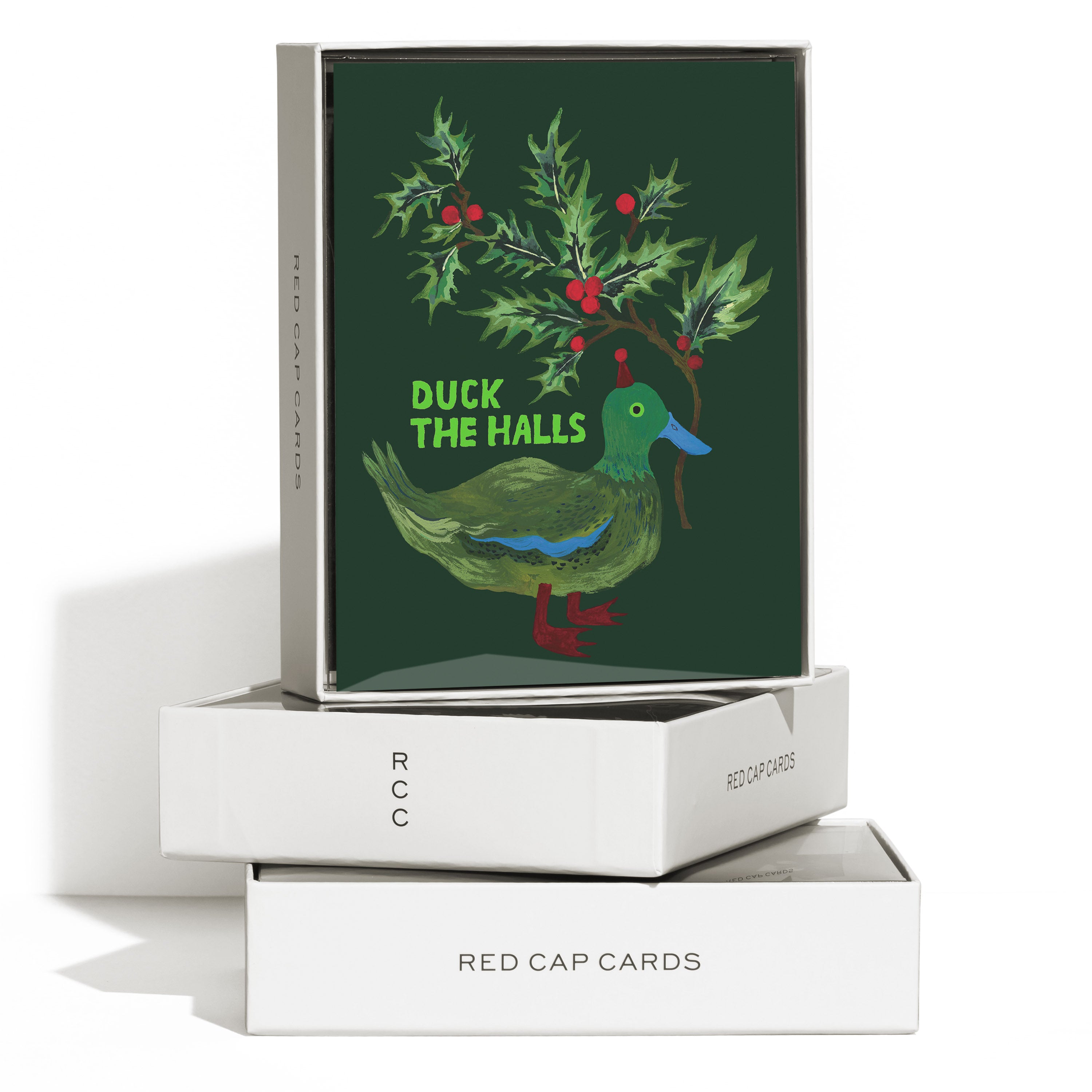 Boxed set of 8 Christmas cards with mistletoe and a duck wearing a party hat with "Duck the Halls" text on green background.