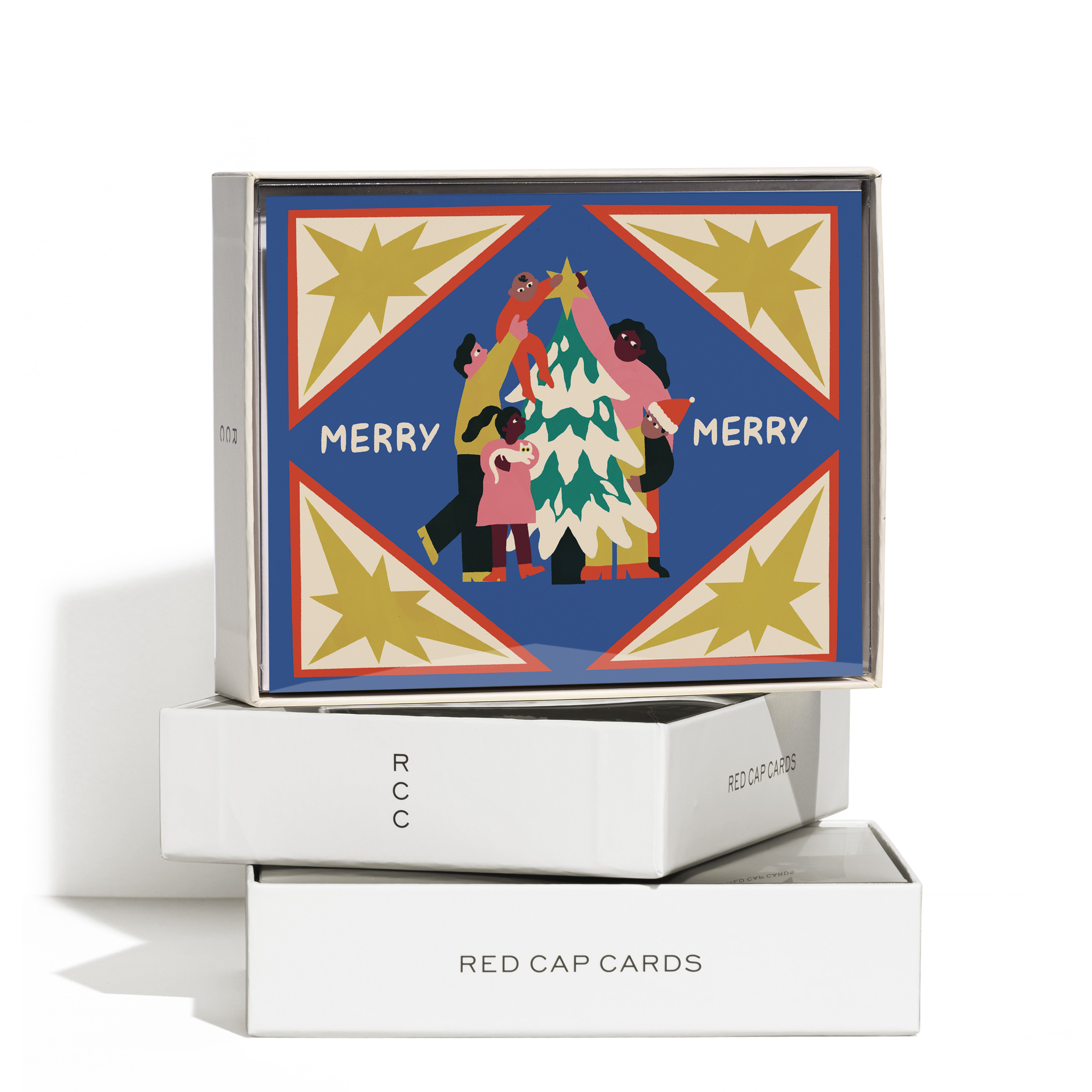 Boxed set of 8 "Merry Merry" holiday cards with a family placing a star atop a tree, starburst border on blue background.