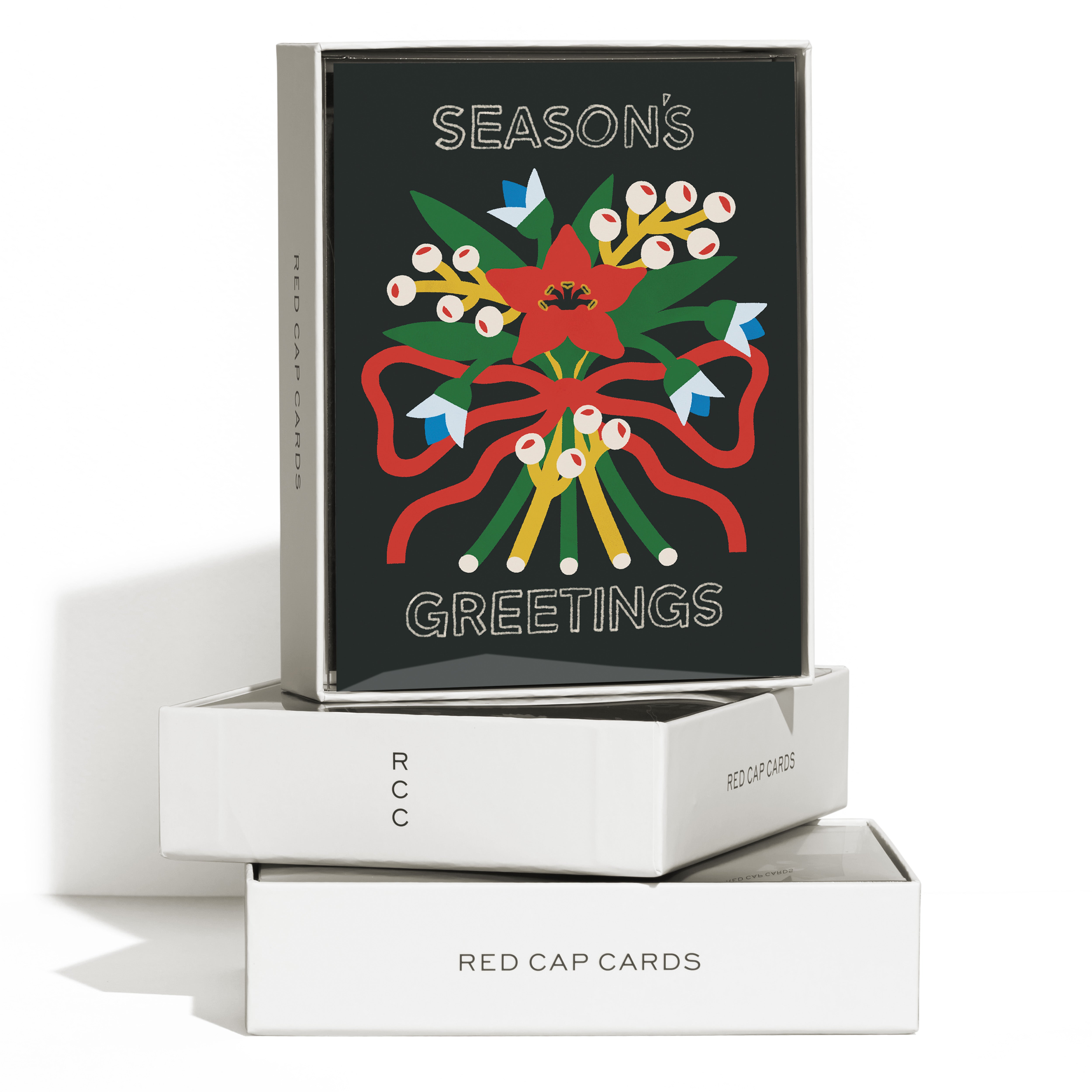 Boxed set of 8 "Season's Greetings" holiday cards with poinsettia bouquet, red ribbon bow, white lettering on black background.