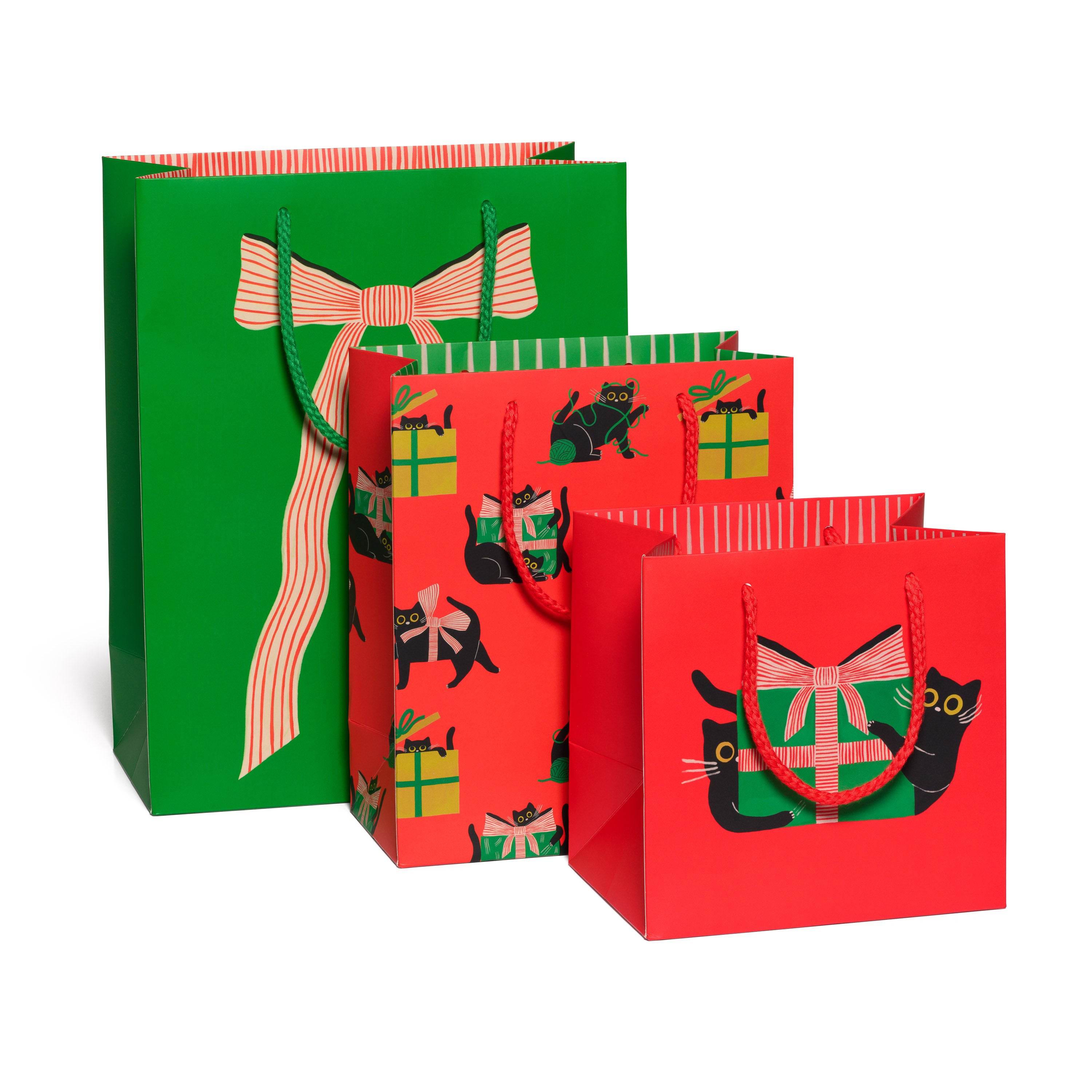 Collection of 3 holiday gift bags with a green striped bow design and a red design featuring black cats and wrapped presents.