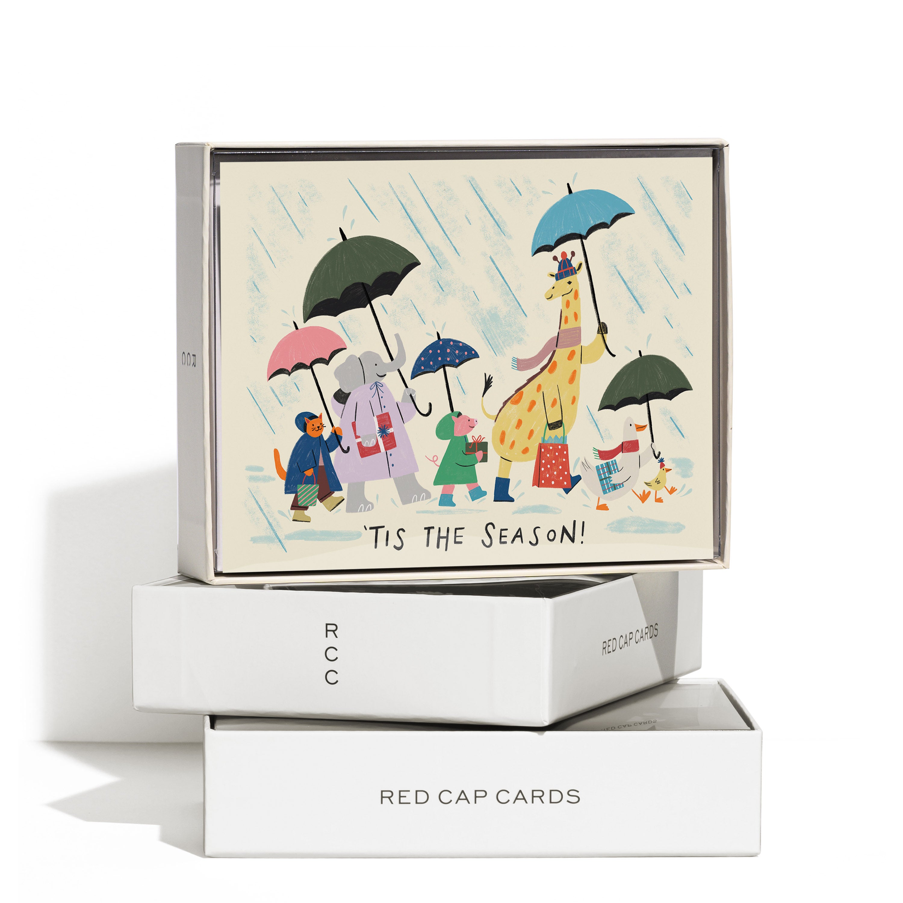 Boxed set of 8 Greeting cards with illustration of animals walking in the rain under umbrellas, with 'TIS THE SEASON!' text.