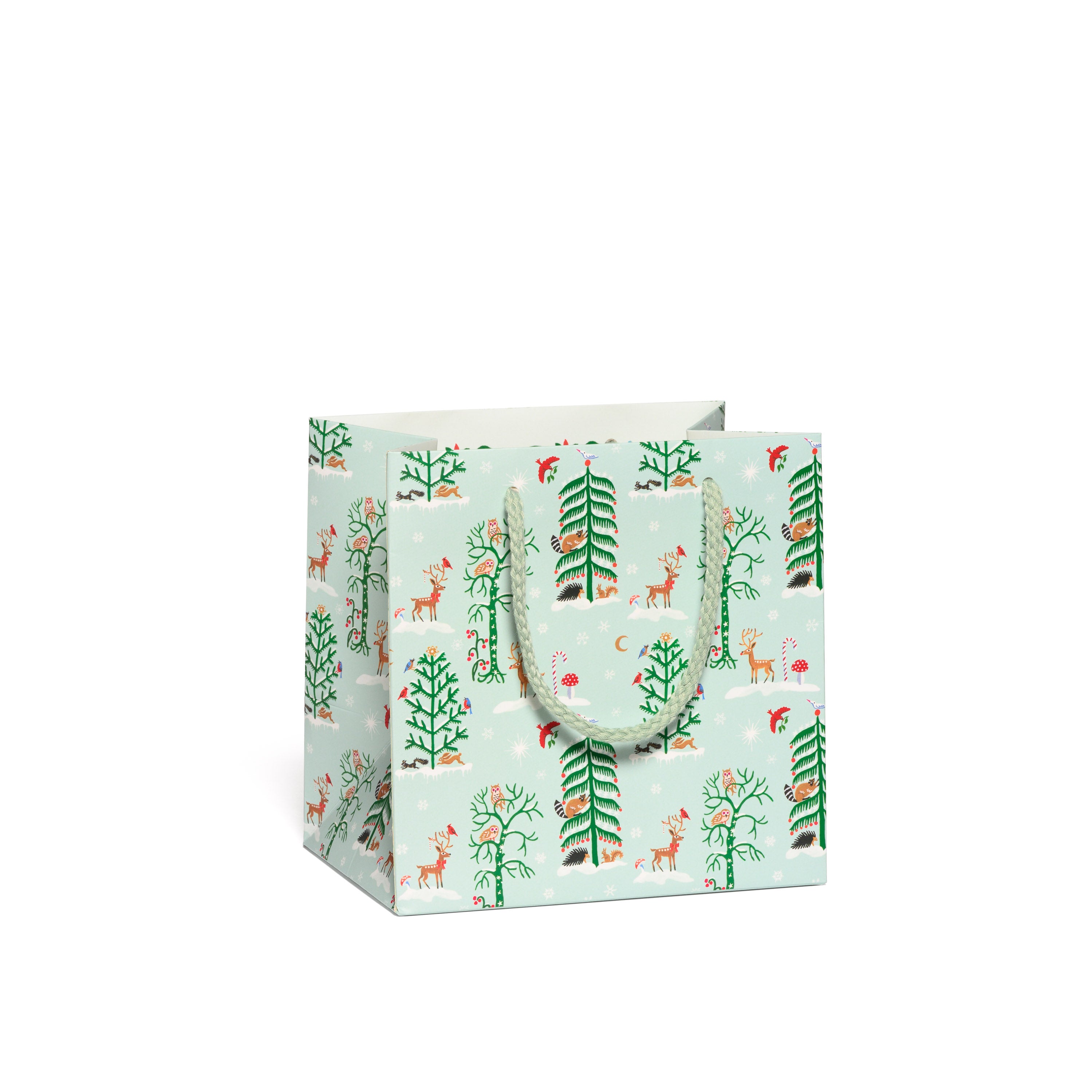 Small Holiday Gift bag with forest and woodland creature design on a white background.