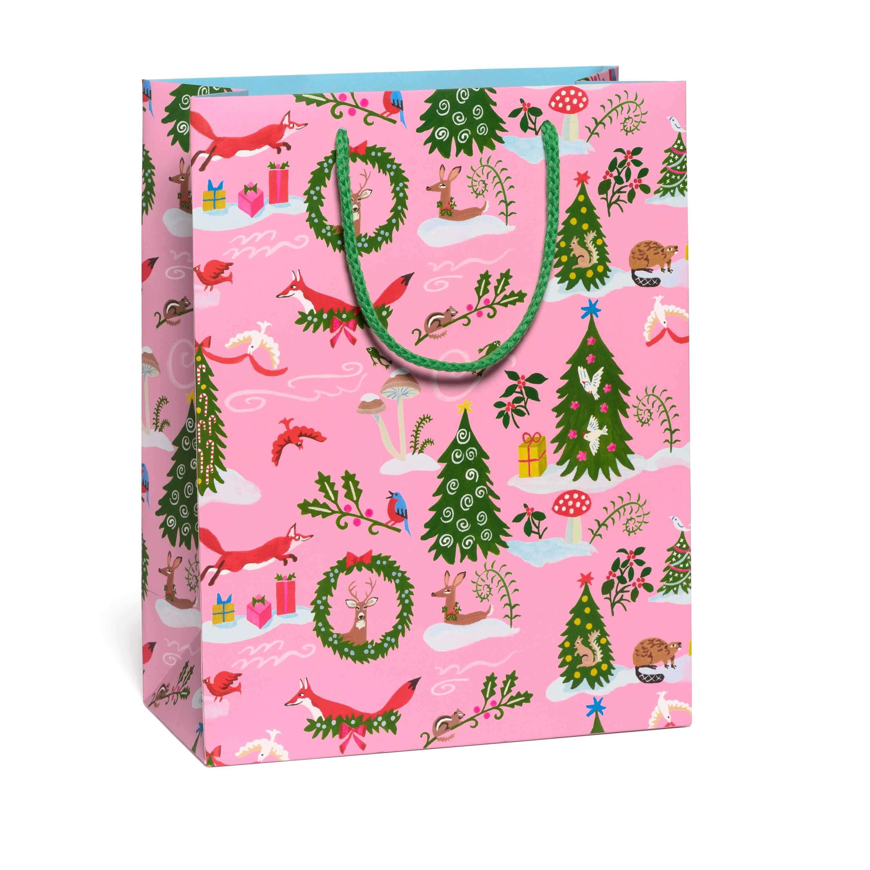 Large Pink gift bag with Christmas-themed and woodland creature design on a white background.