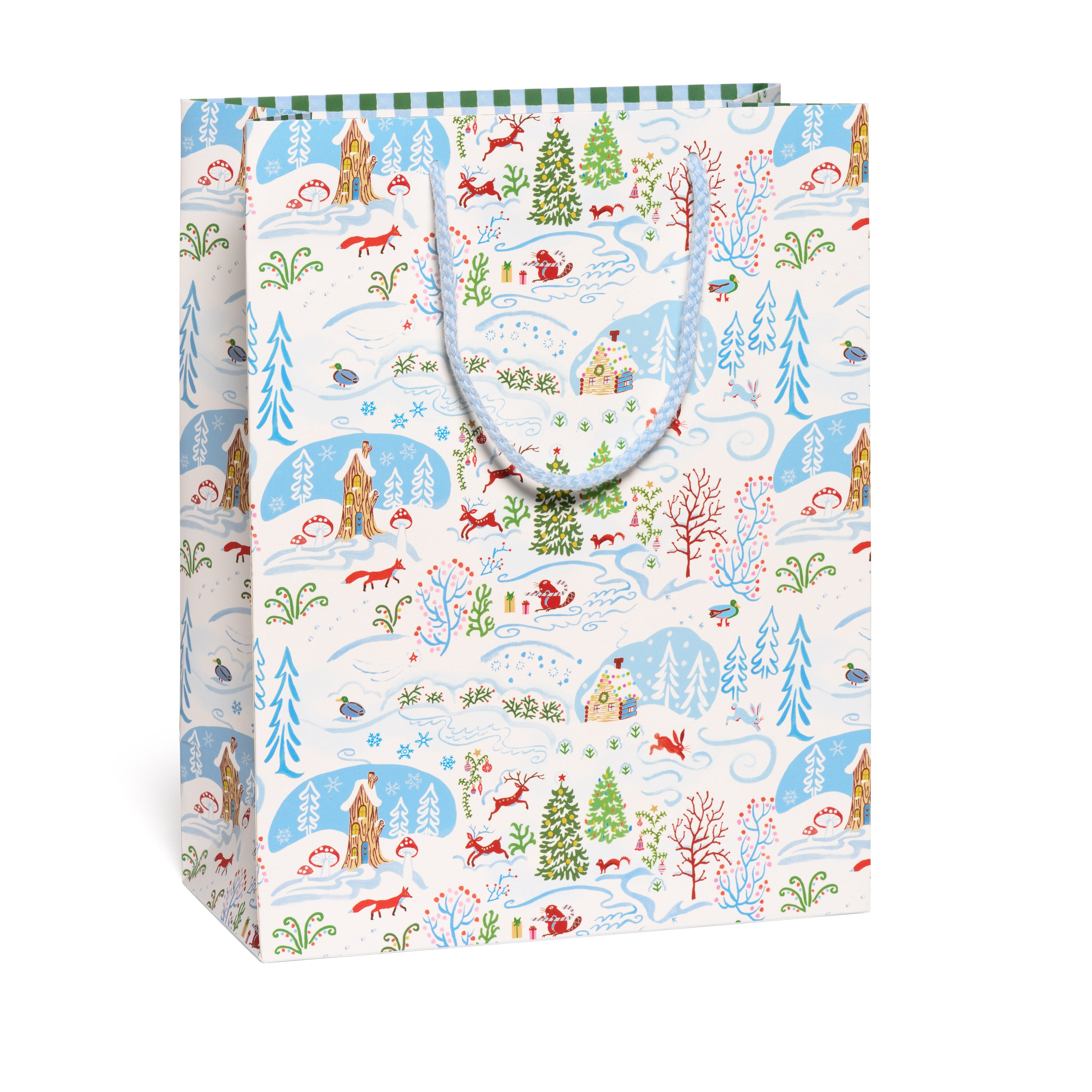 Gift bag with woodland creature and forest winter scene design on a white background.