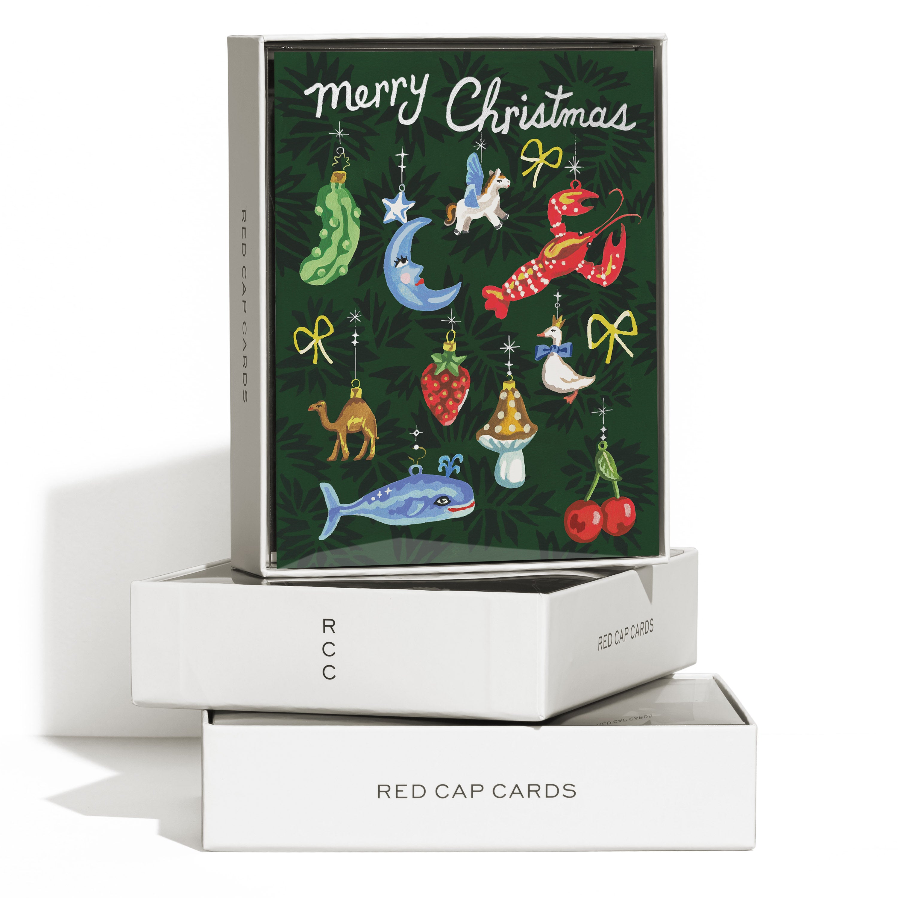 Boxed set of 8 'Merry Christmas' cards featuring various colorful ornaments on a green background.