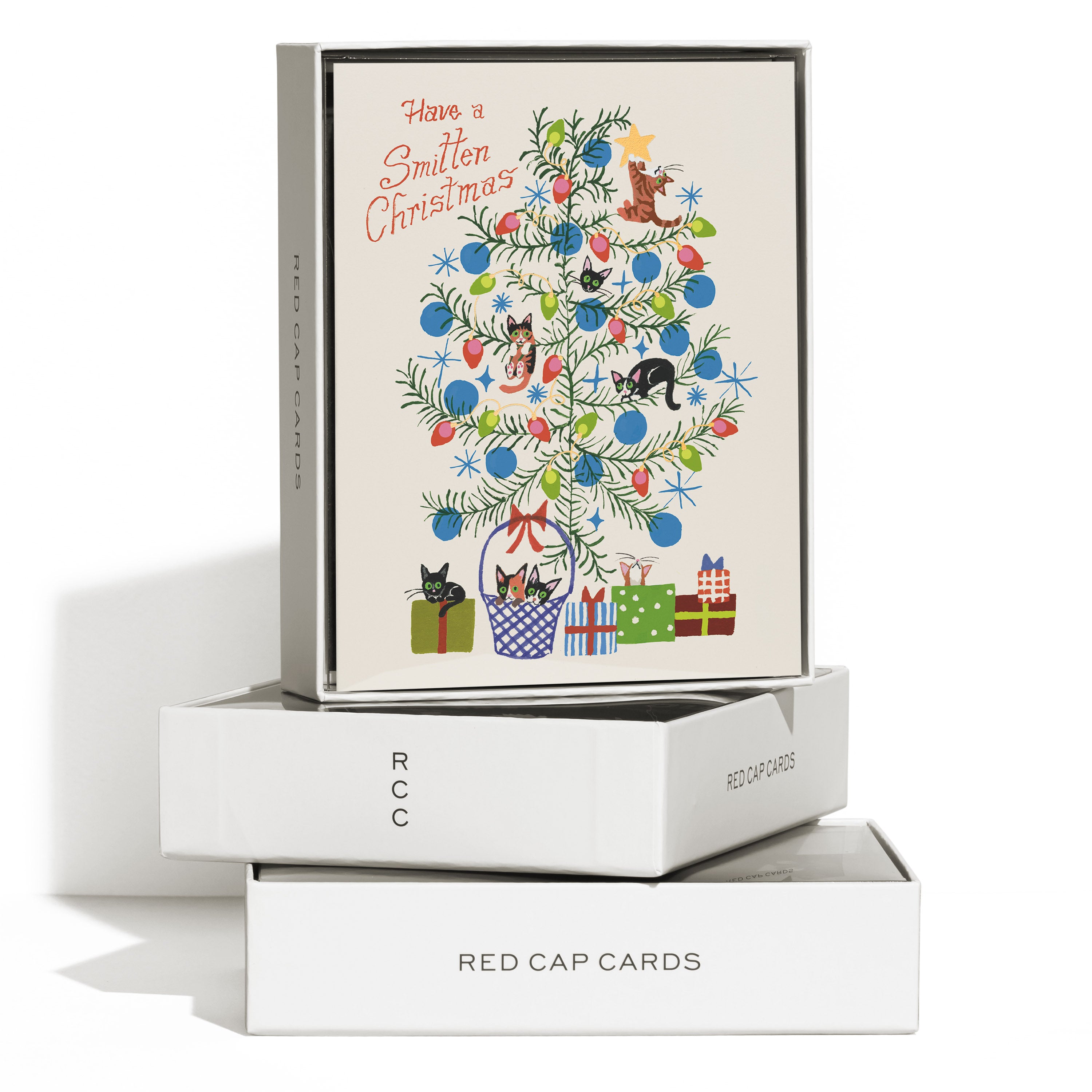Boxed set of 8 Christmas cards with a tree decorated with colorful lights, cats, presents and "Have a Smitten Christmas" text.