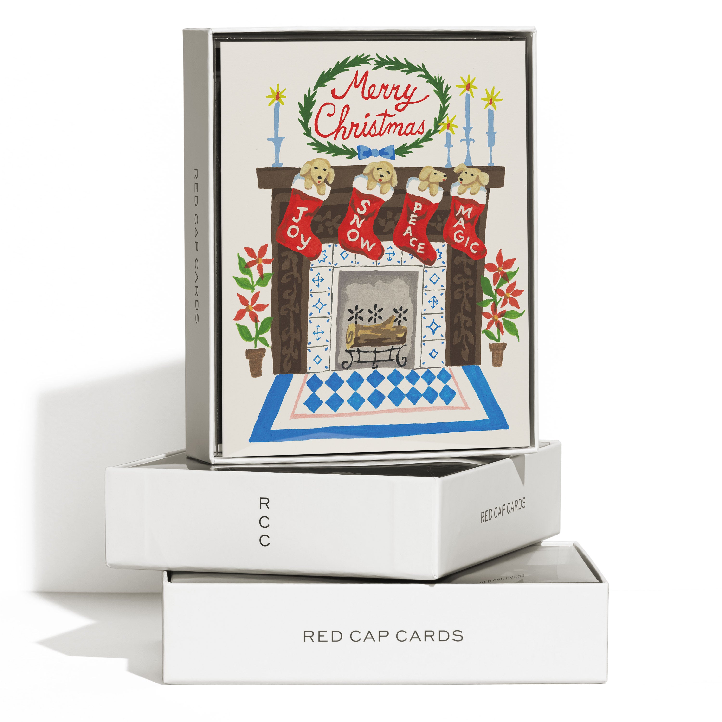 Boxed set of 8 Christmas Cards with illustrated puppies in stockings hung on fireplace mantle with festive text.