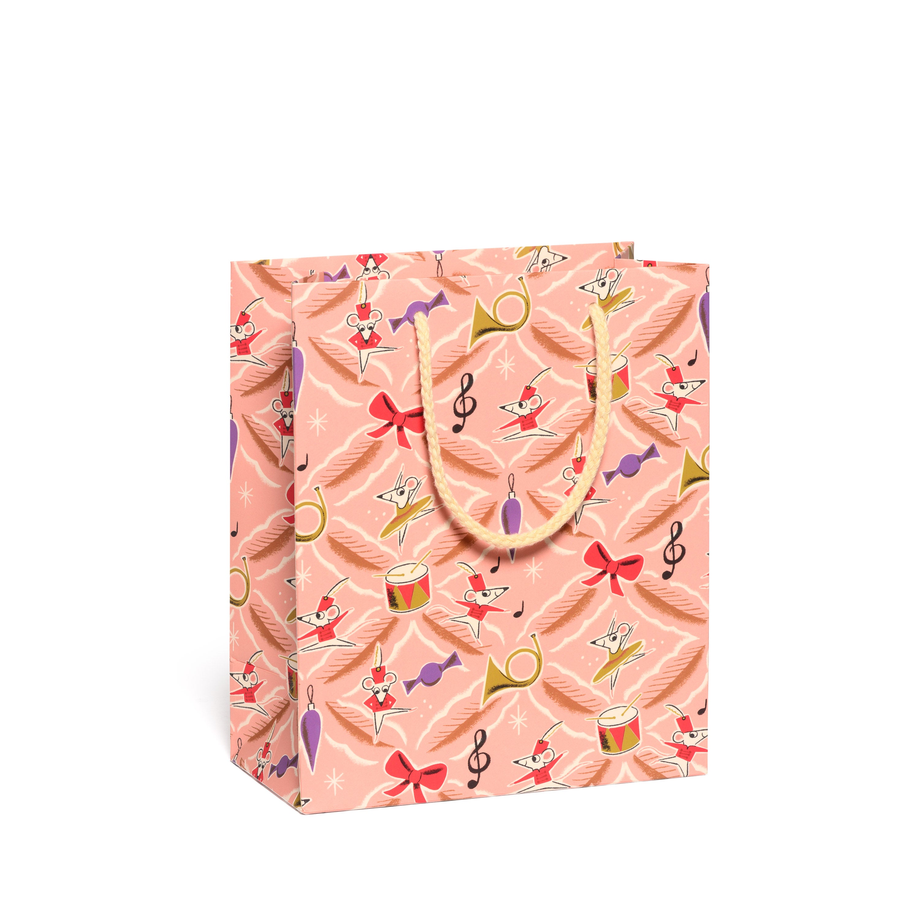 Medium pink Gift bag with festive design featuring music notes, mice, instruments, and red bows.