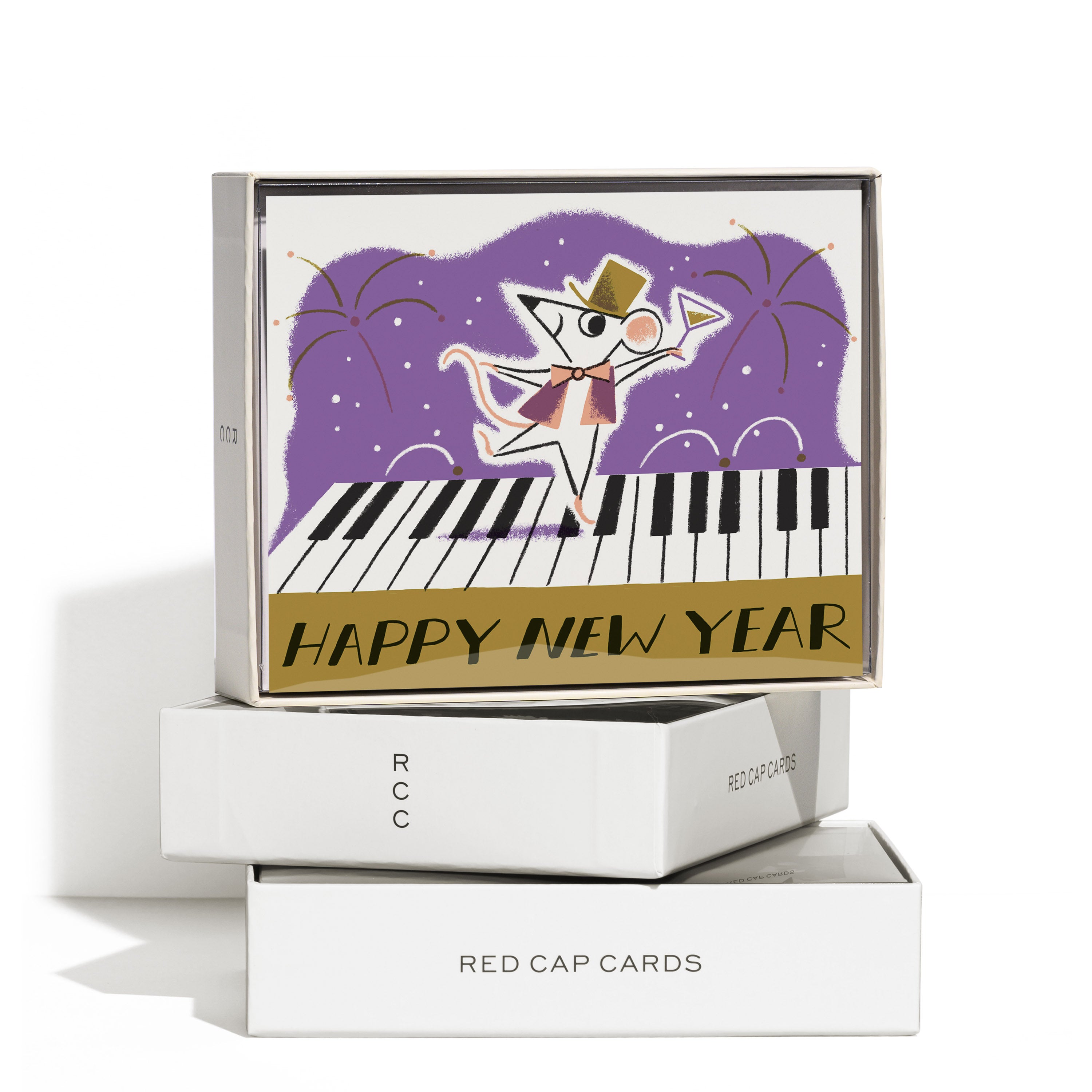 Boxed set of 8 Greeting cards with retro illustrated mouse dancing on piano keys with fireworks and 'Happy New Year' text.