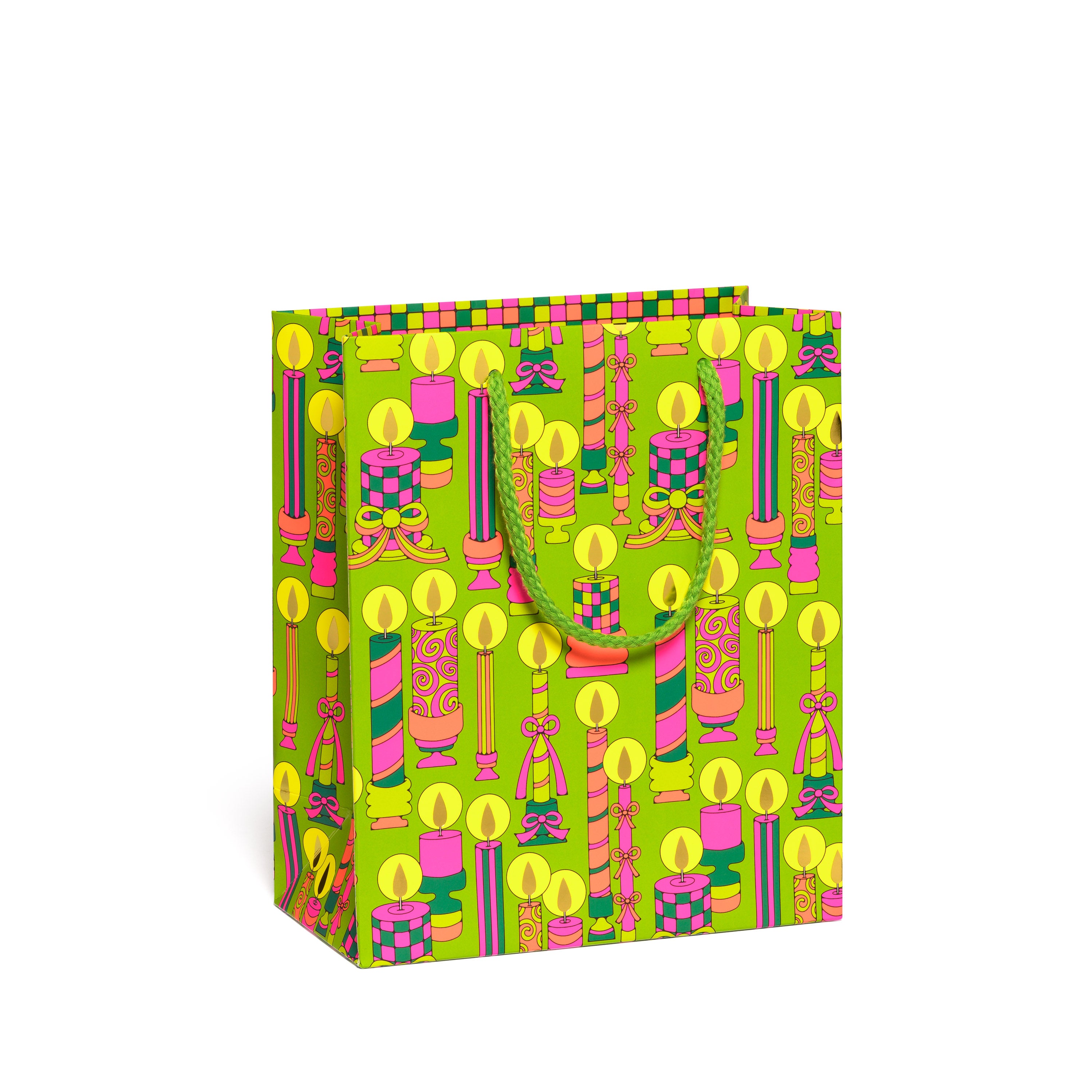 Colorful gift bag with a colorful holiday candle pattern on a green background.