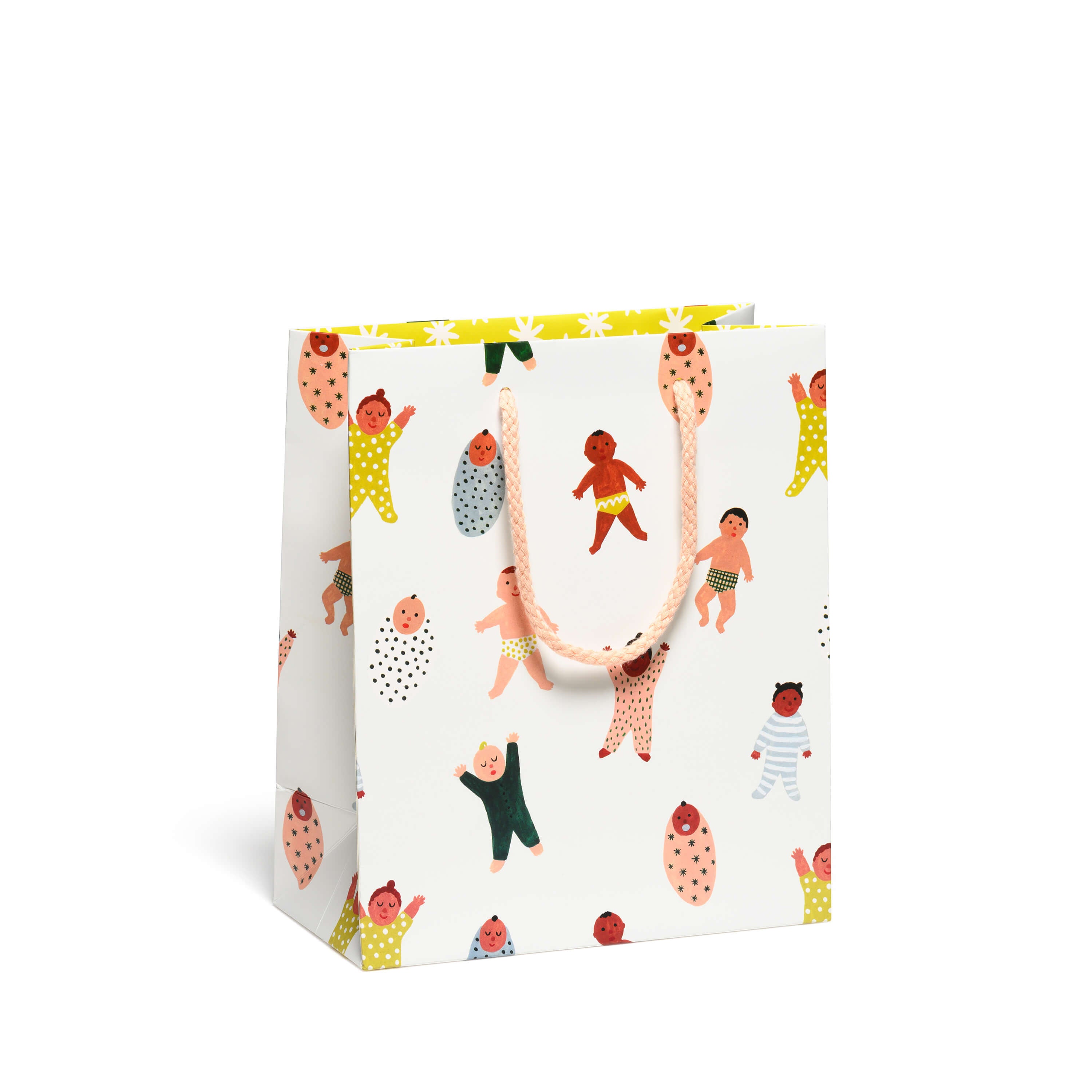 Medium paper gift bag with newborn baby pattern design on a white background and peach colored rope handle.