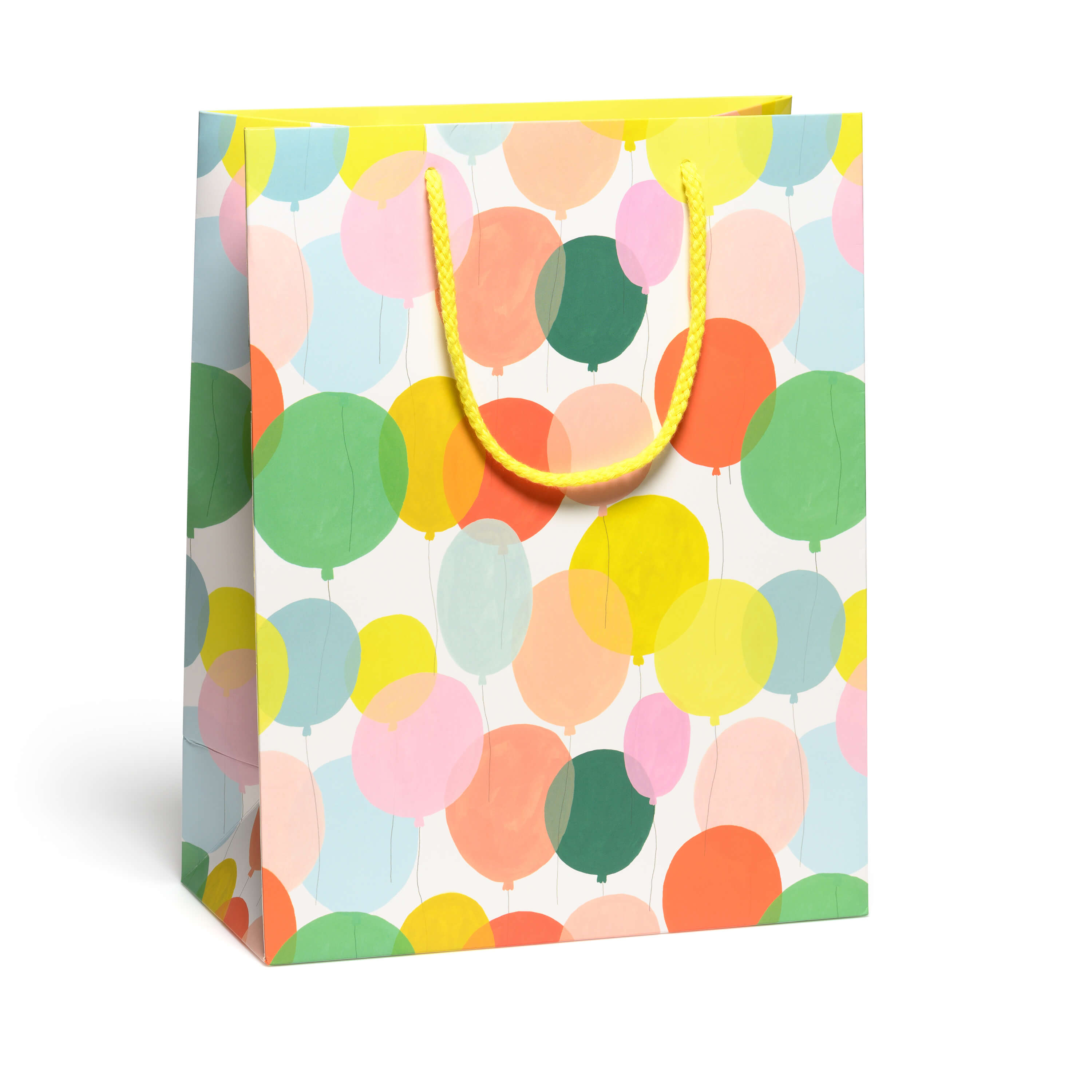 Large gift bag with a colorful balloon pattern and a yellow rope handle on a white background.