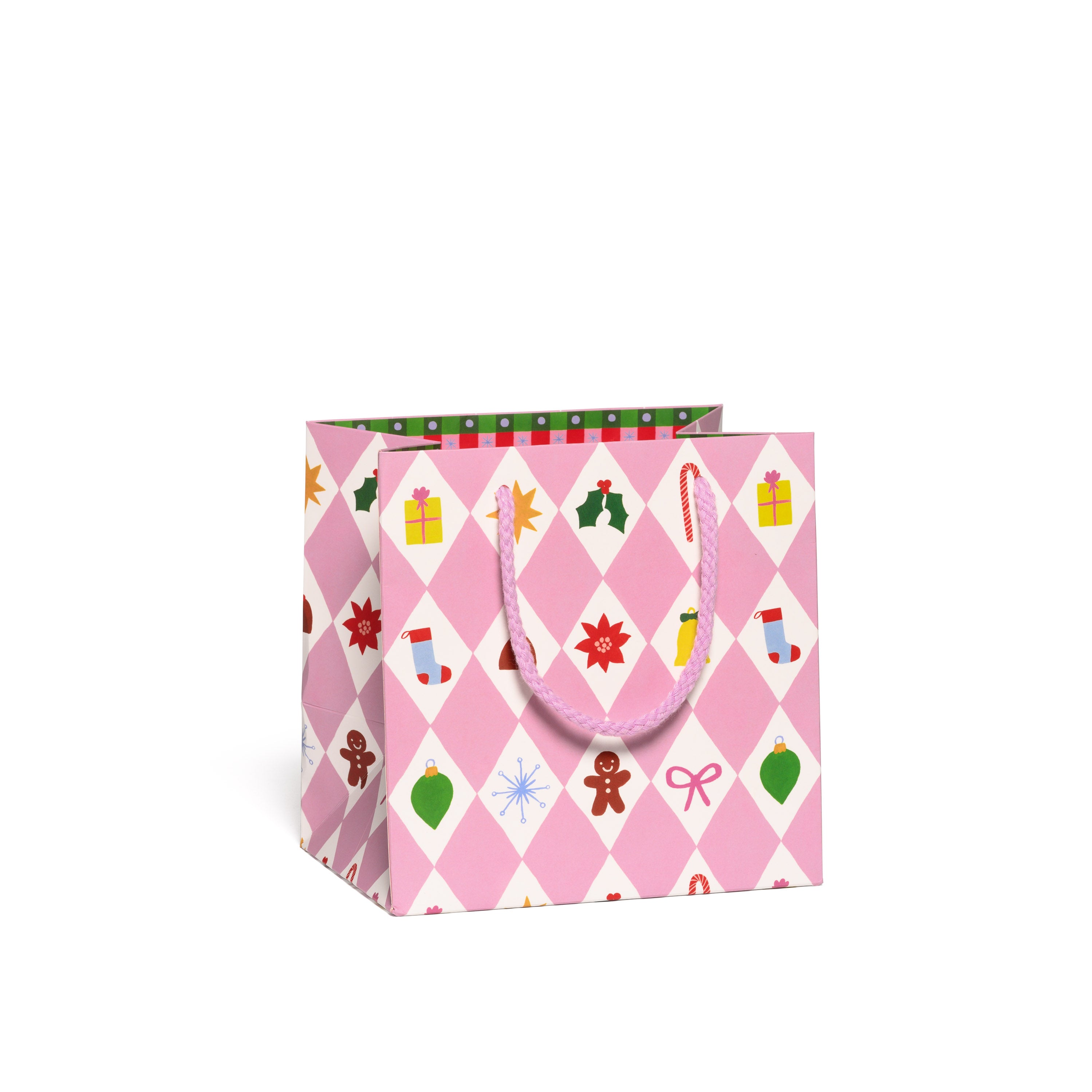 Small pink gift bag with Christmas-themed patterns in white diamond shapes on a white background.