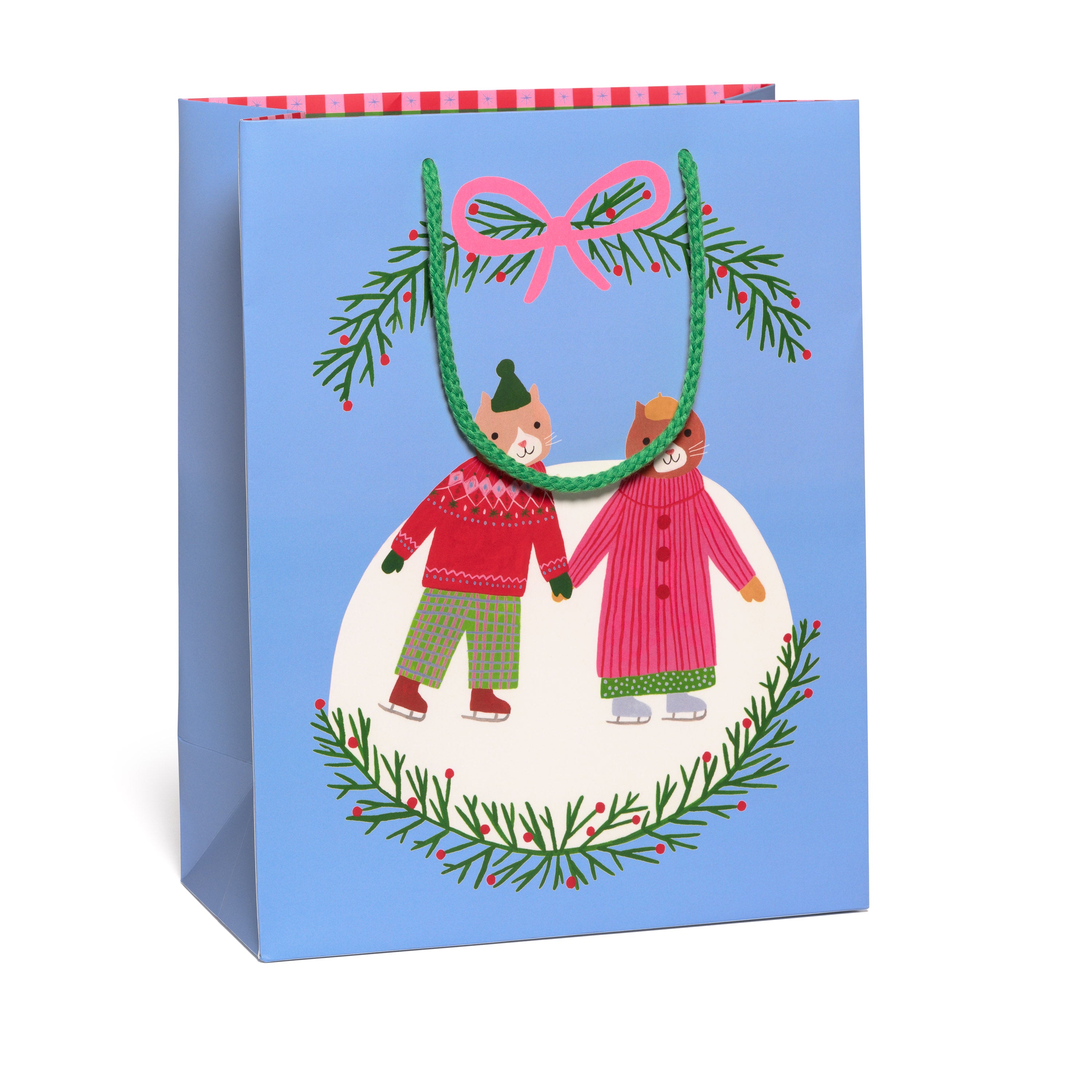 Large Gift bag with Christmas design of two cats ice skating, with a pink bow on a blue background.