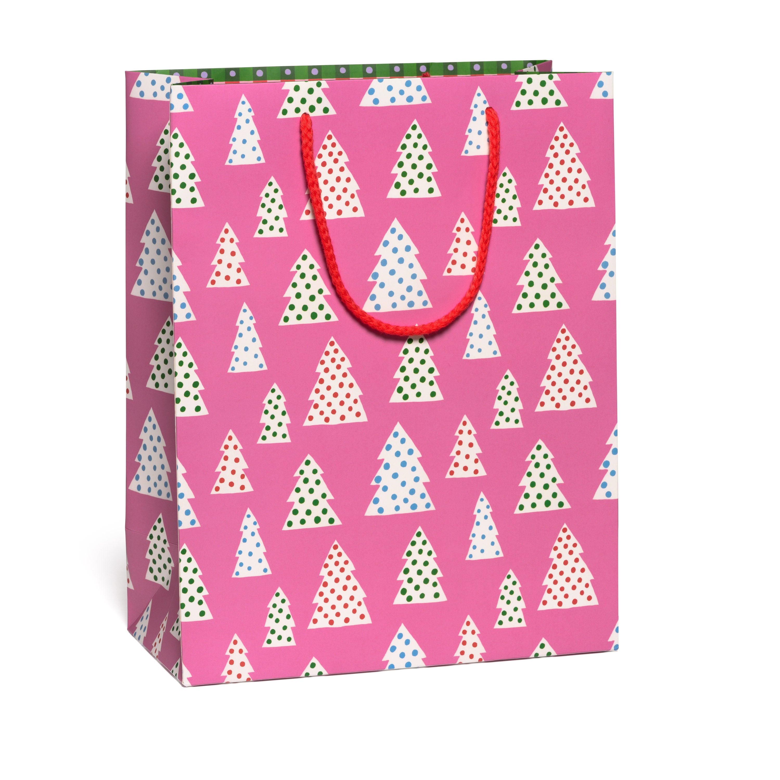 Large Gift bag with Christmas tree and polka dot pattern on a pink background.