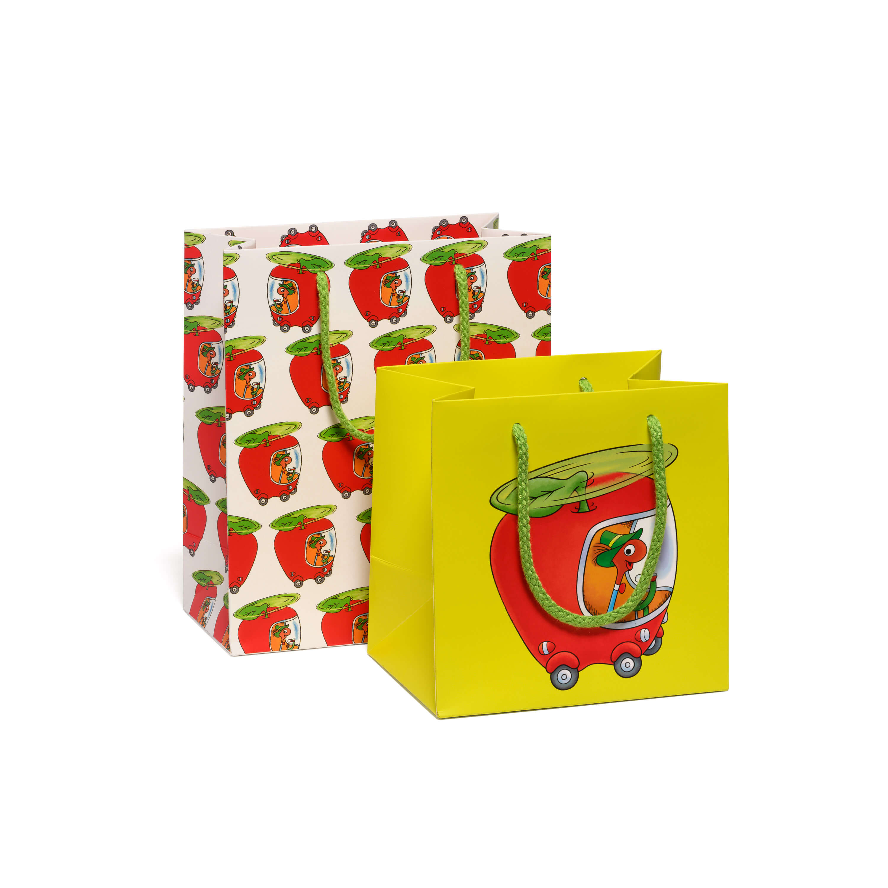 Two colorful gift bags with the Lowly Worm driving an apple car design with green rope handle on a white background.