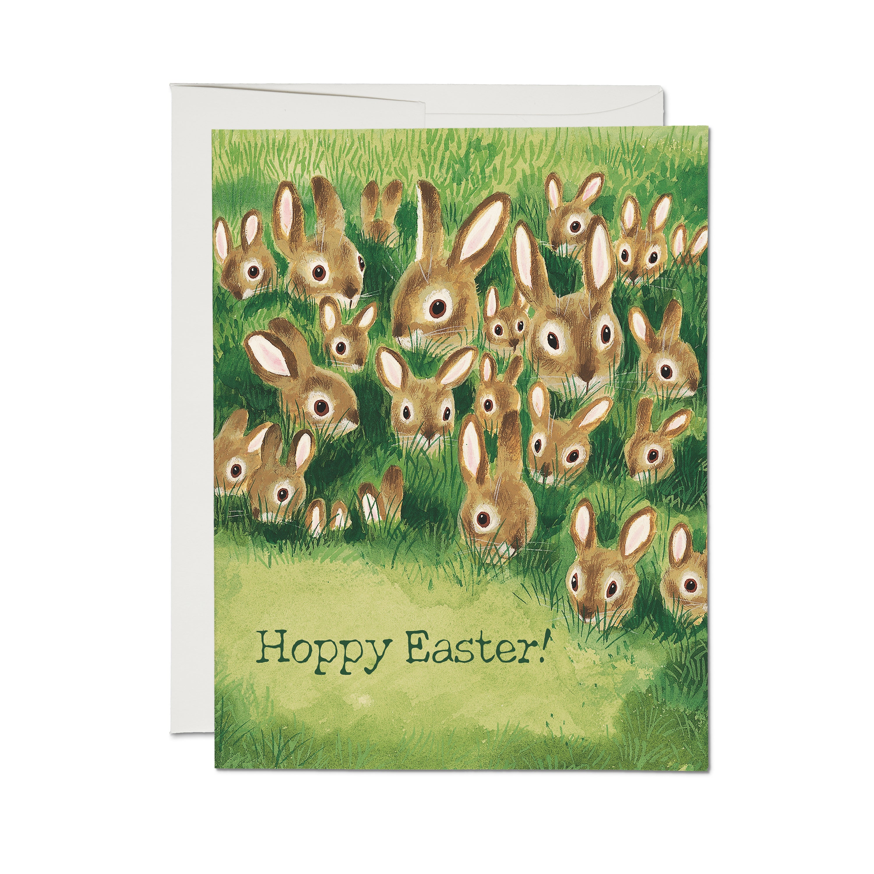 Easter card with cartoon rabbits in a green grass field with text "Hoppy Easter!" 