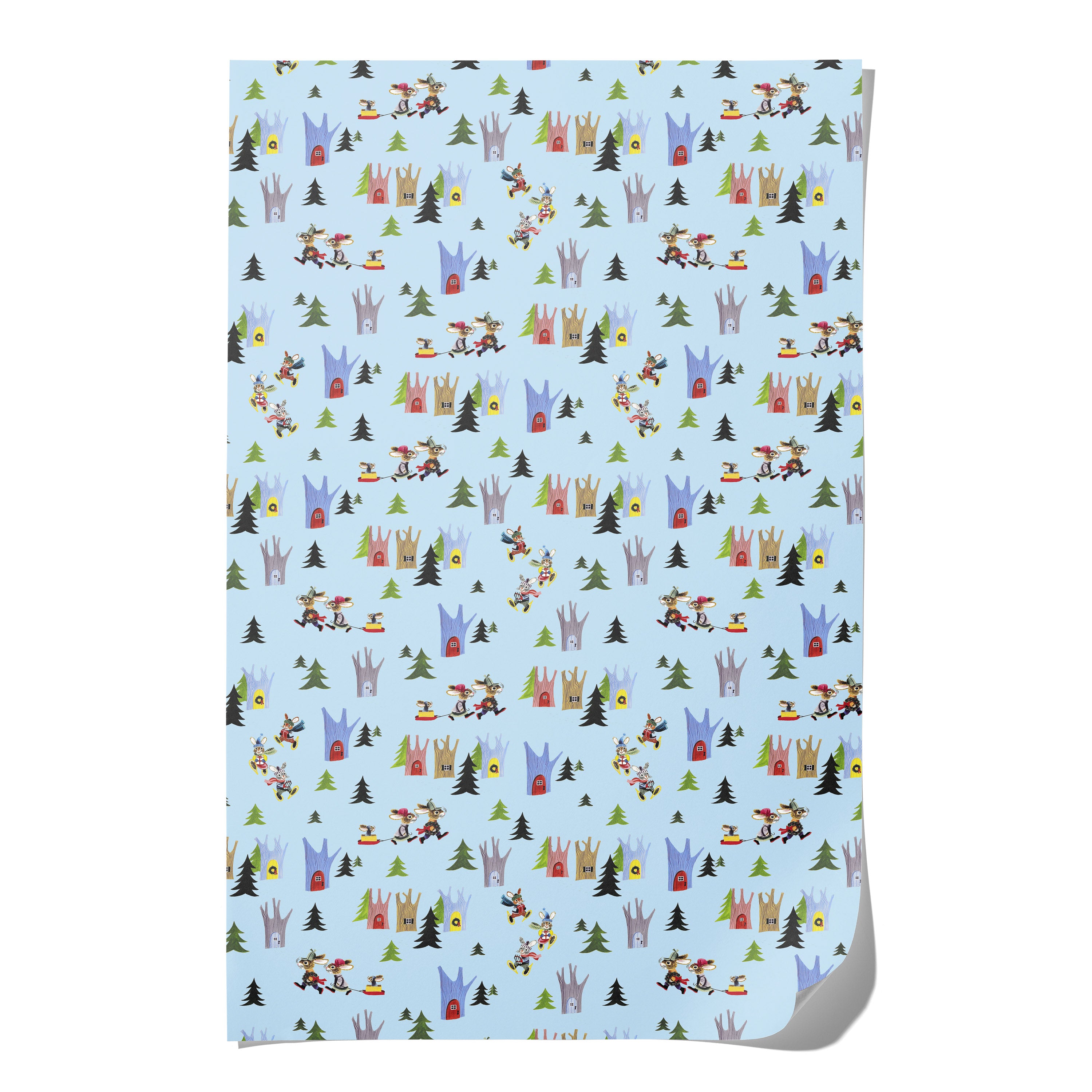 A sheet of wrapping paper with a light blue background and a repeating whimsical pattern of cartoon rabbits and trees.