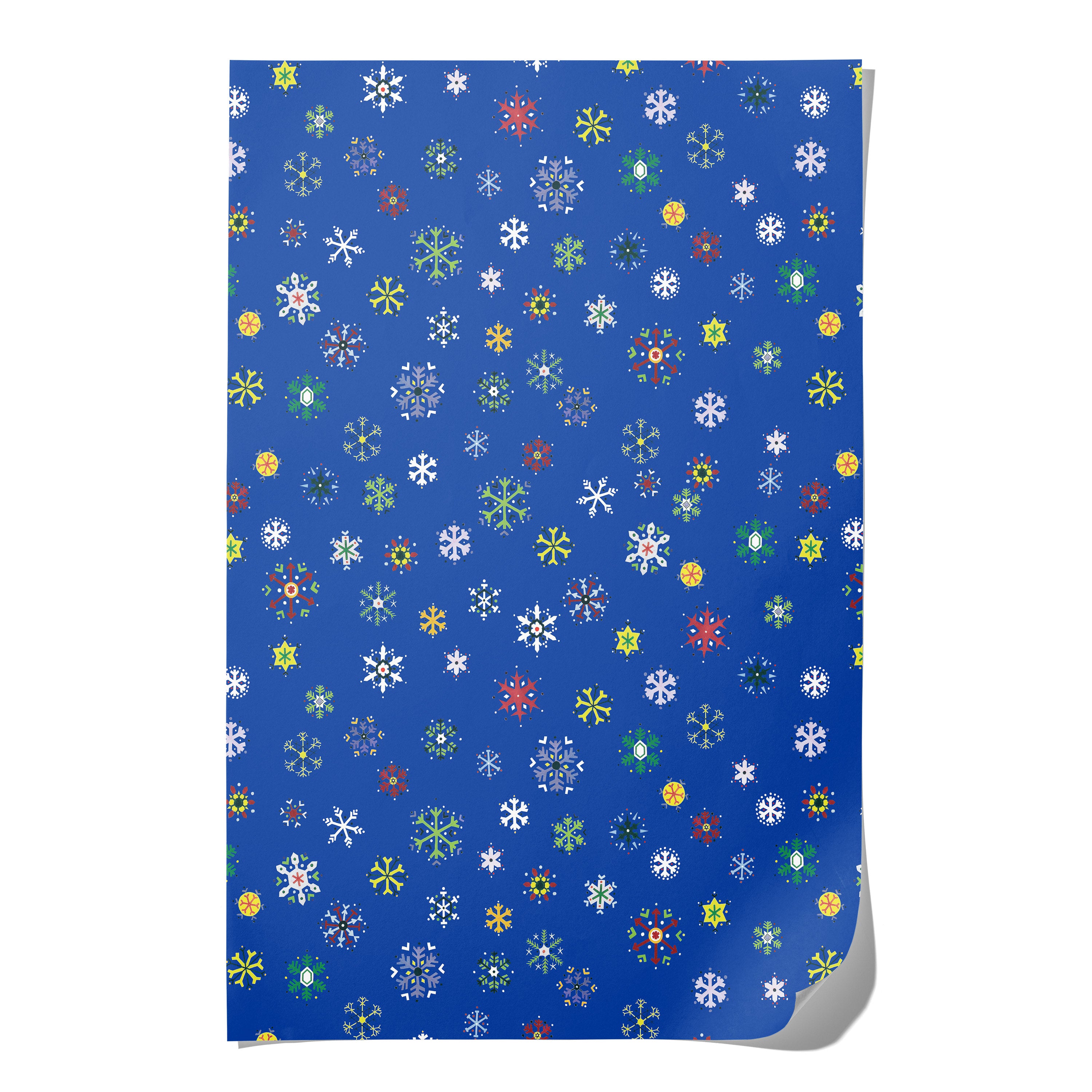 Blue wrapping paper with multicolor snowflake design on white background.