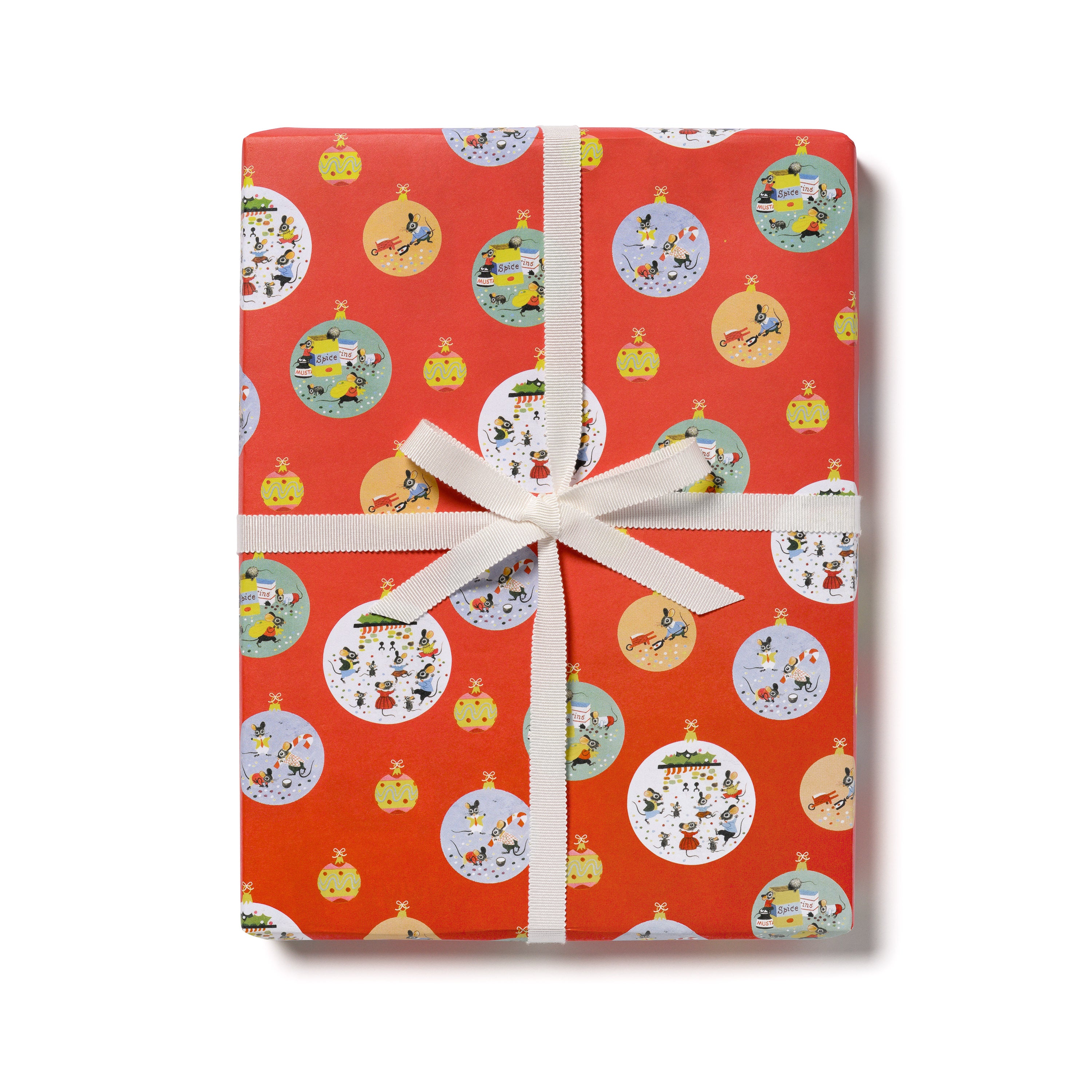 Bright red wrapping paper with colorful cartoon Christmas scenes depicted in different ornament baubles with white ribbon.