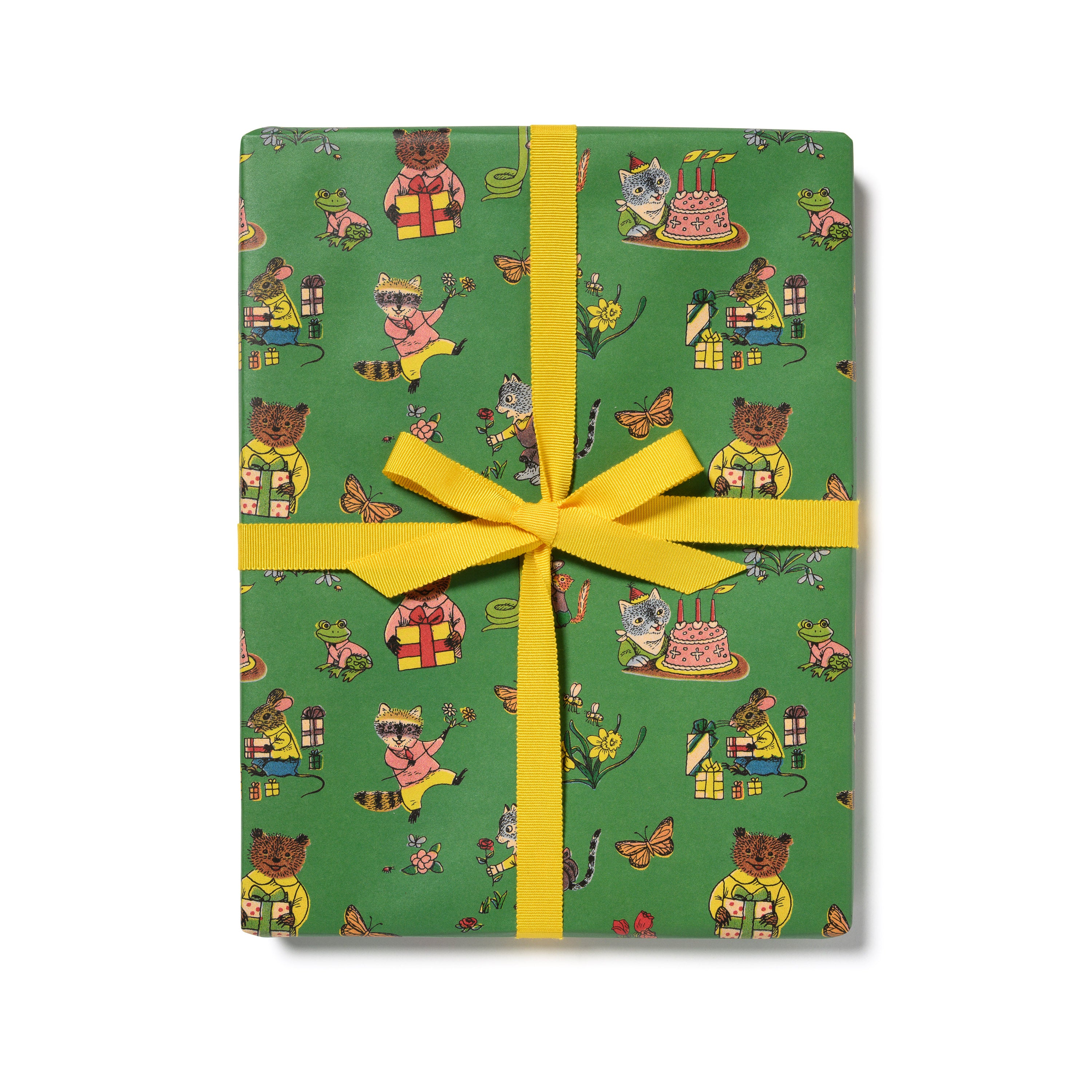 Gift wrap with birthday themed woodland animal illustrations with presents, cake and flowers on a green background.