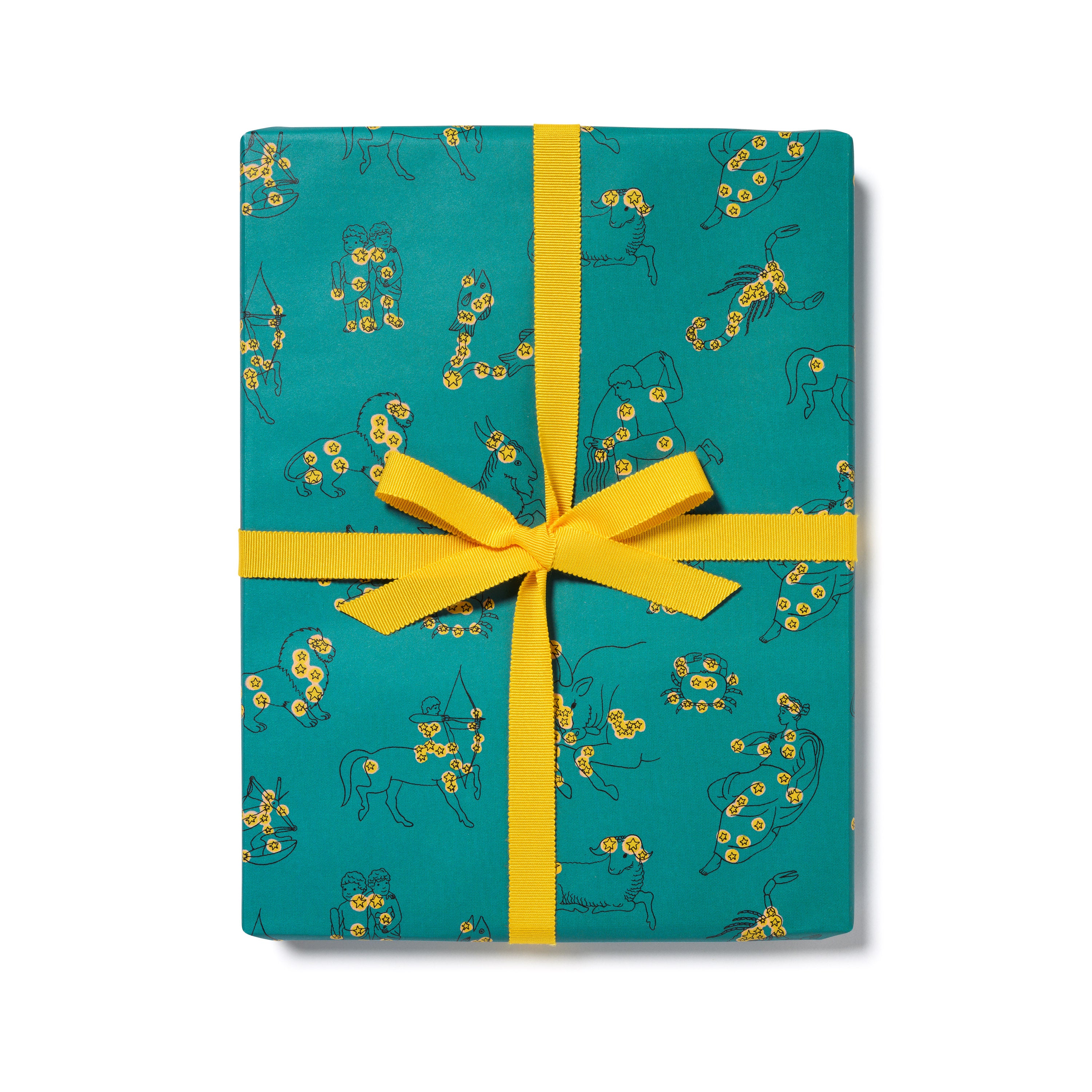 Gift wrap with Zodiac constellations and yellow stars on a teal background with a yellow ribbon.