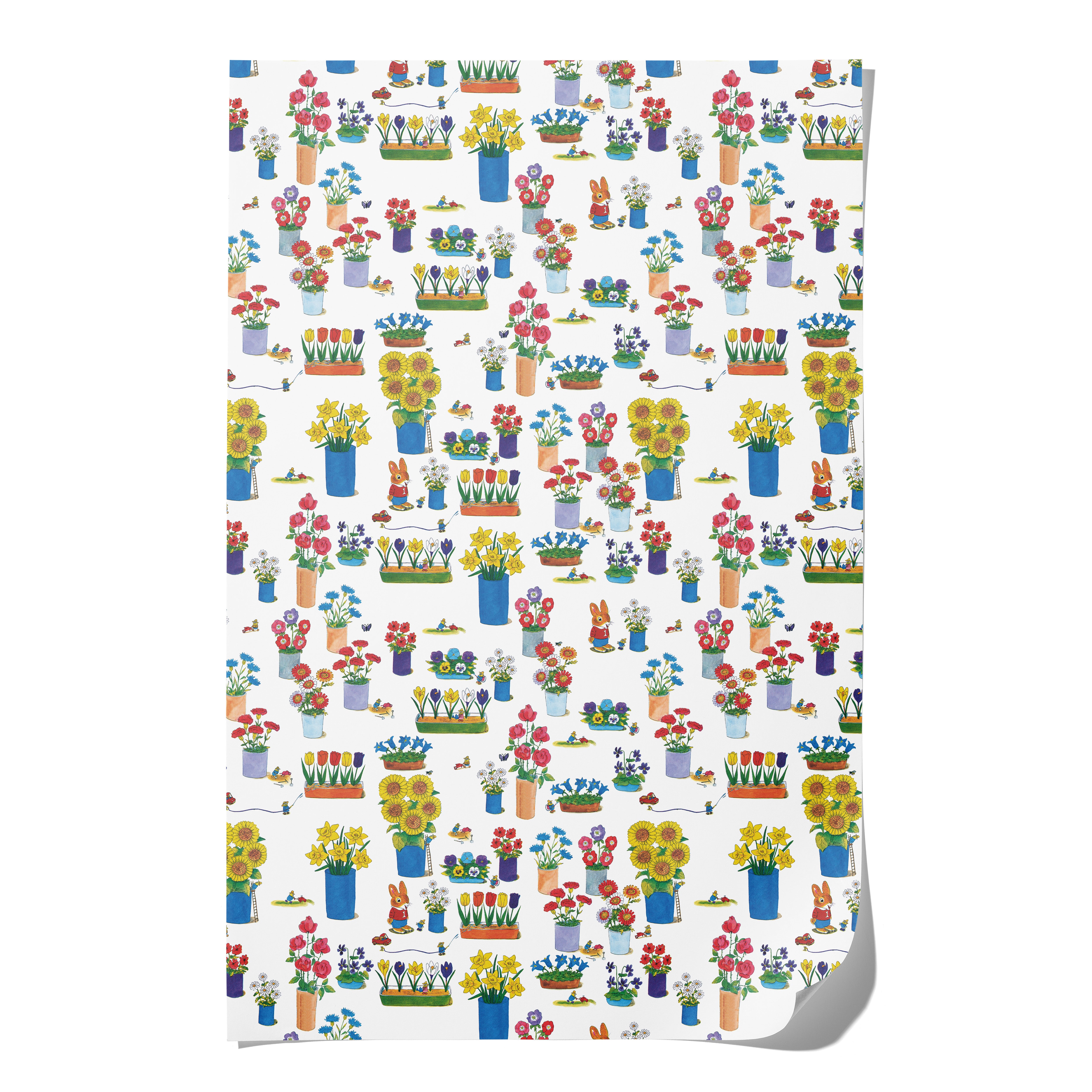 Gift wrap with colorful floral and garden design on a white background.