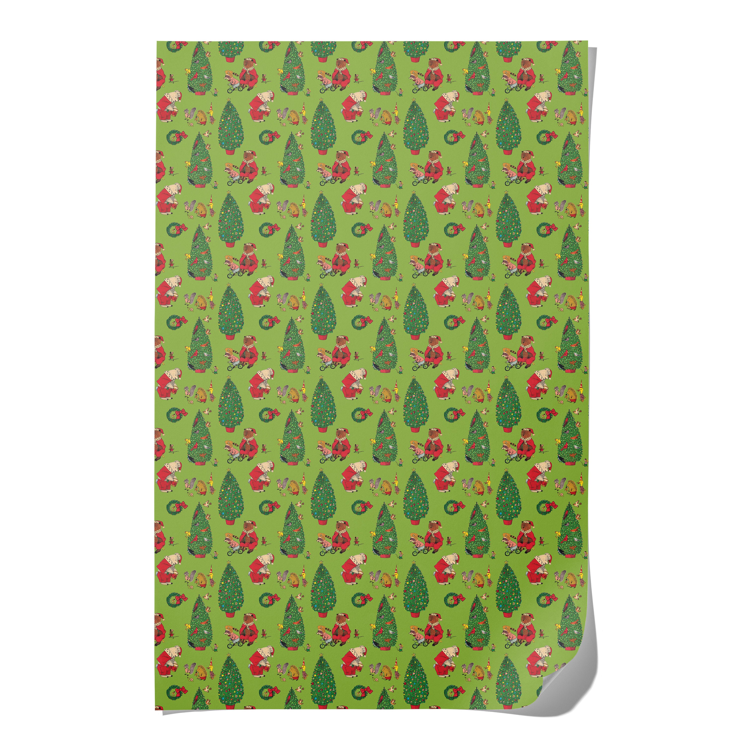 Single sheet of green wrapping paper with holiday themed pattern of cartoon Christmas trees, woodland creatures and bears dressed as Santa.