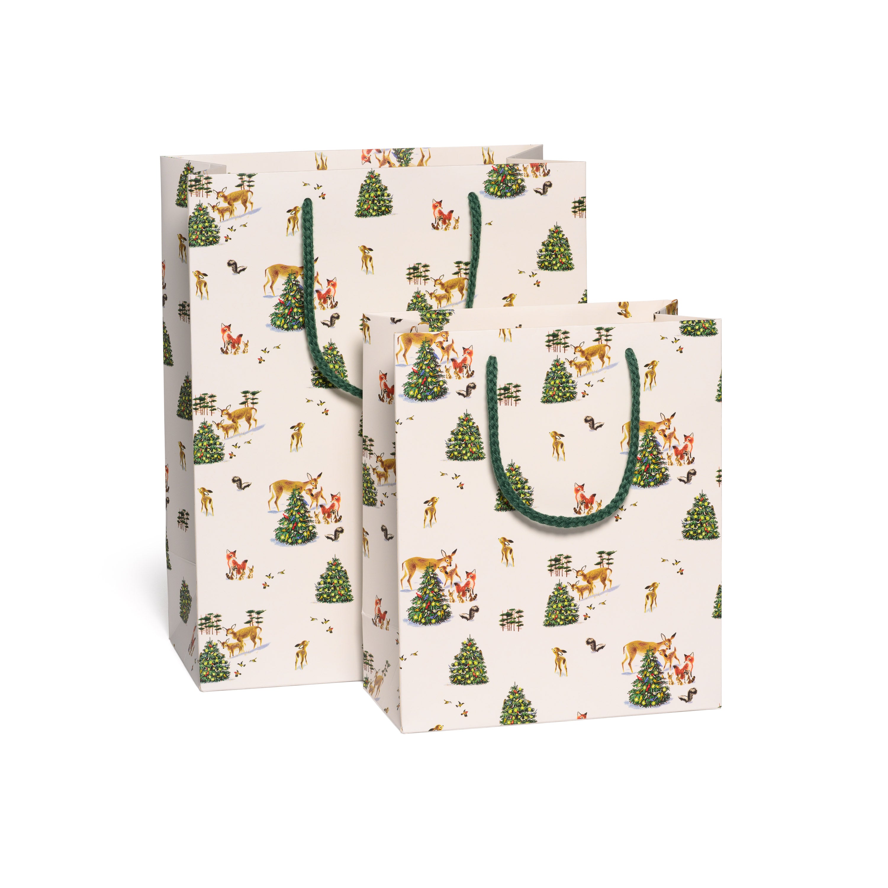 Two Holiday themed gift bags with a forest design featuring trees and animals on a white background.