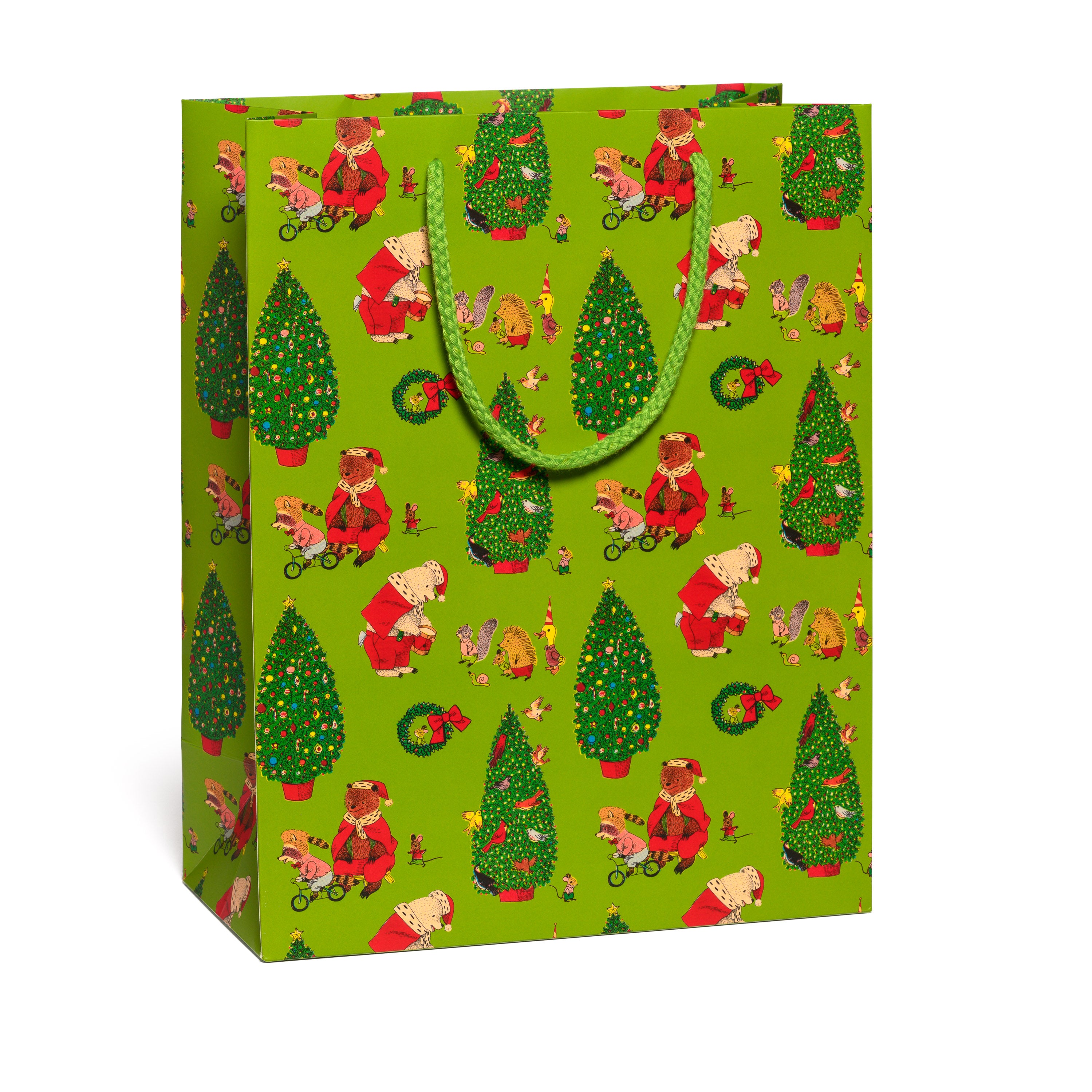 Green gift bag with Christmas-themed design featuring trees and bears on a white background.