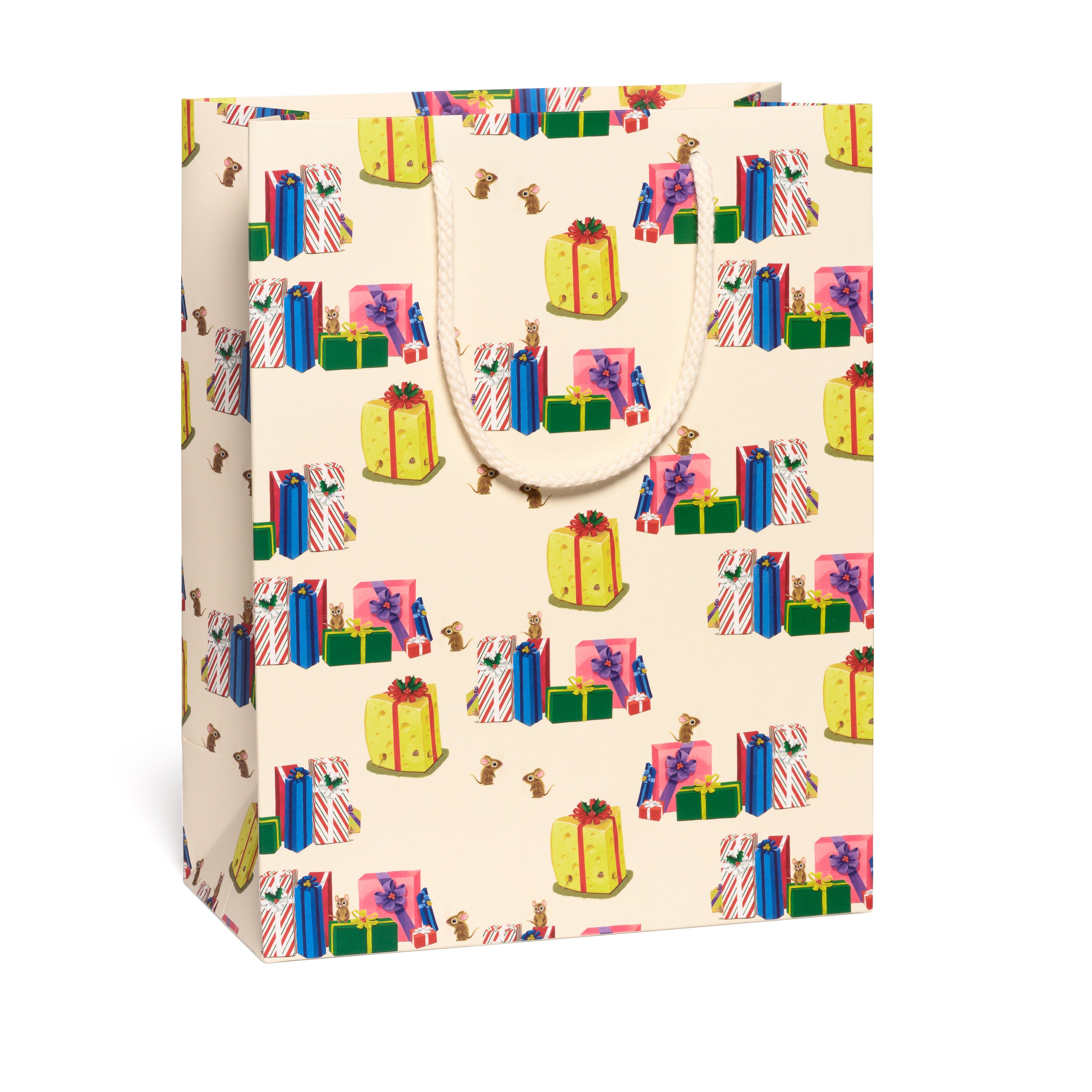 Gift bag with colorful Christmas present pattern on a white background.