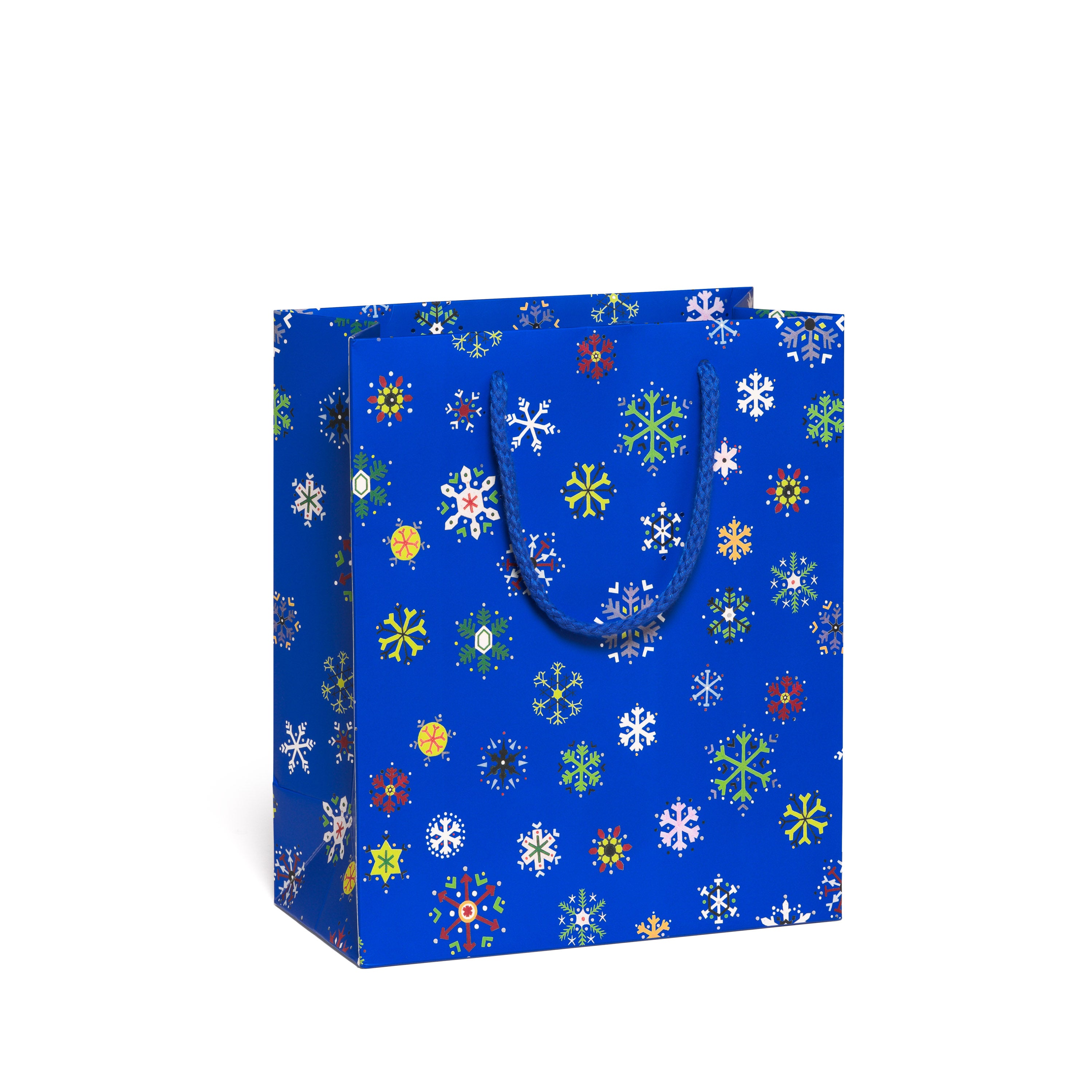 Blue gift bag with colorful snowflake pattern on a white background.