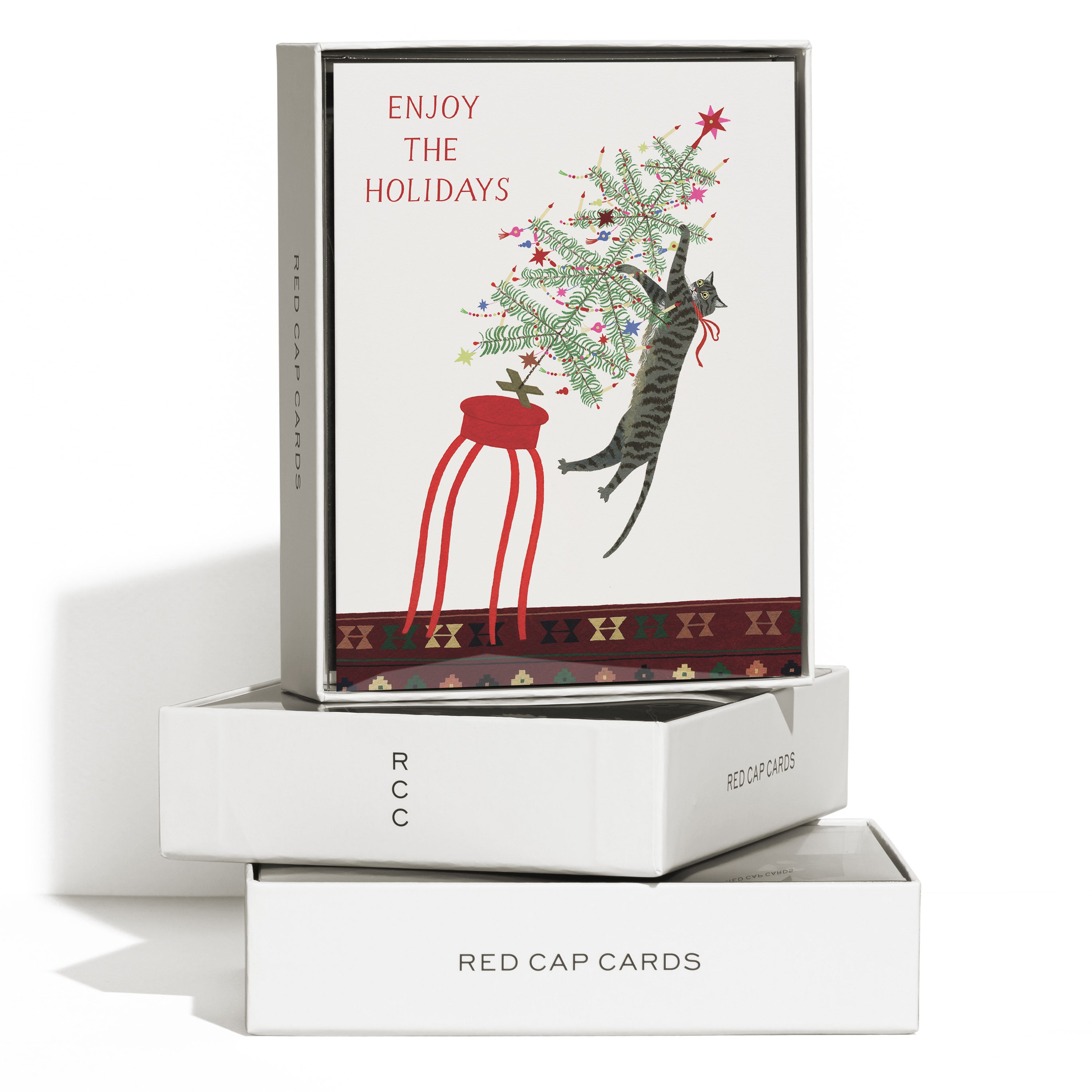 Boxed set of 8 Christmas cards with illustrated cat toppling over a Christmas Tree with 'Enjoy the Holidays' text.