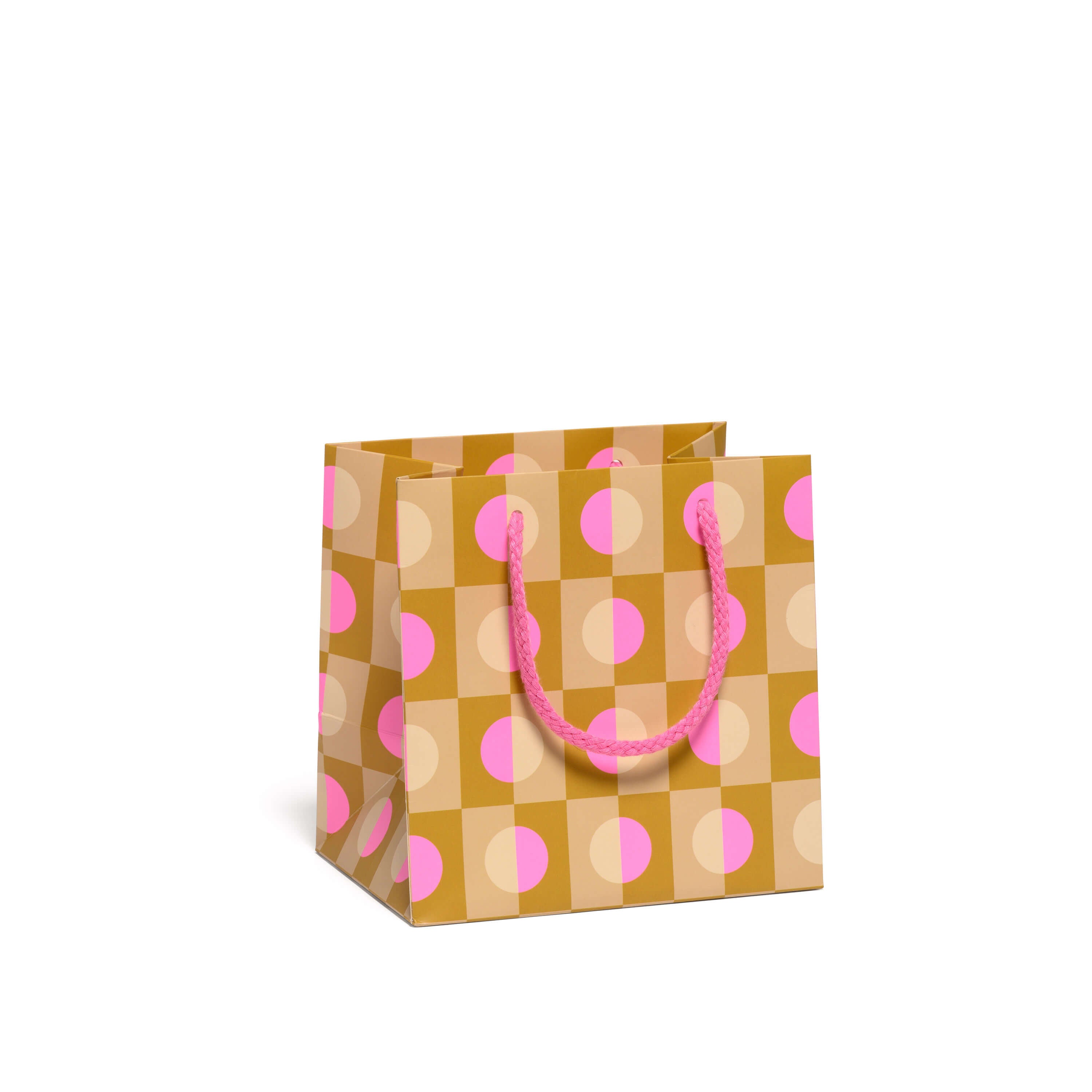 Small gift bag with pink and beige circular and square pattern on a white background.