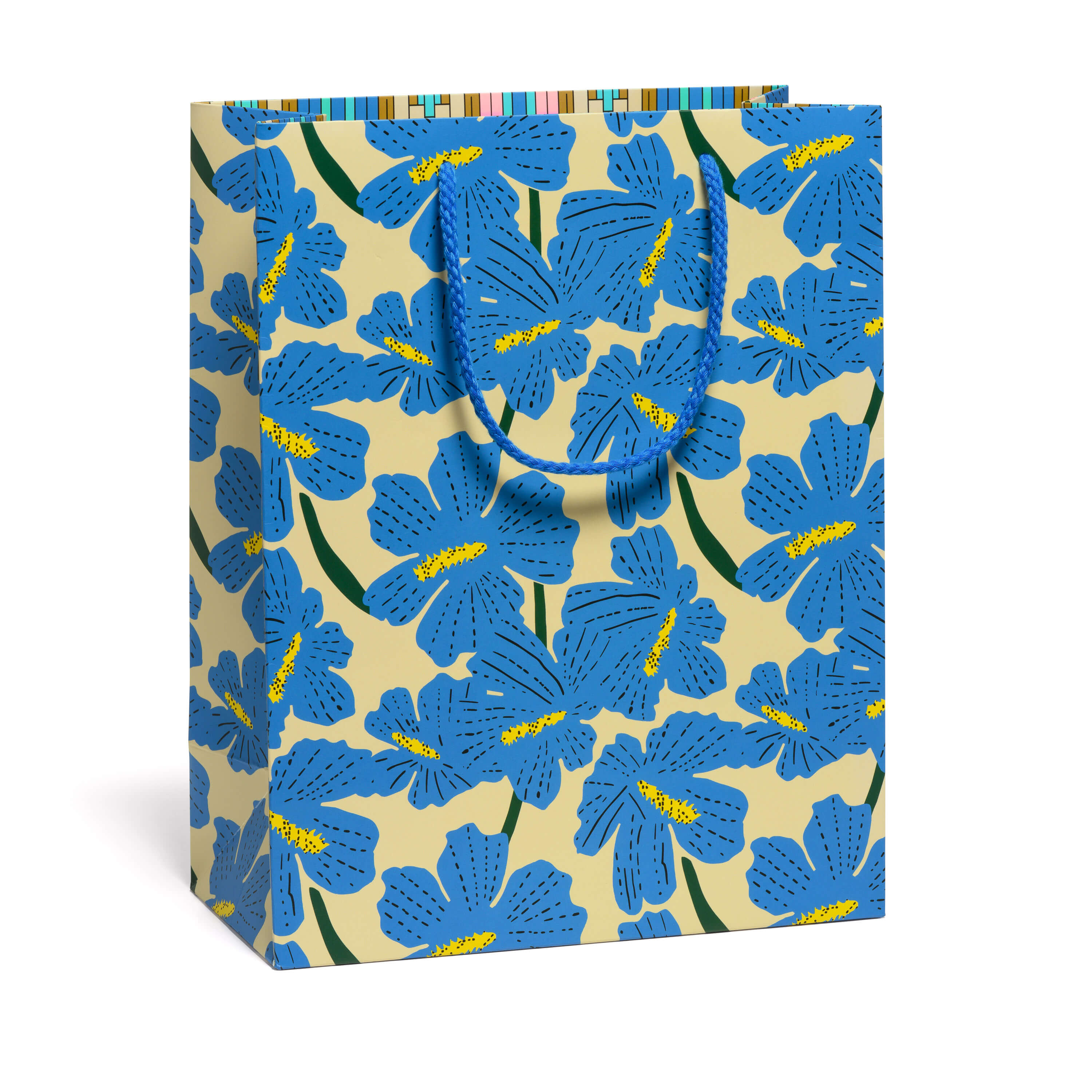 Gift bag with blue hibiscus floral pattern on a beige background.