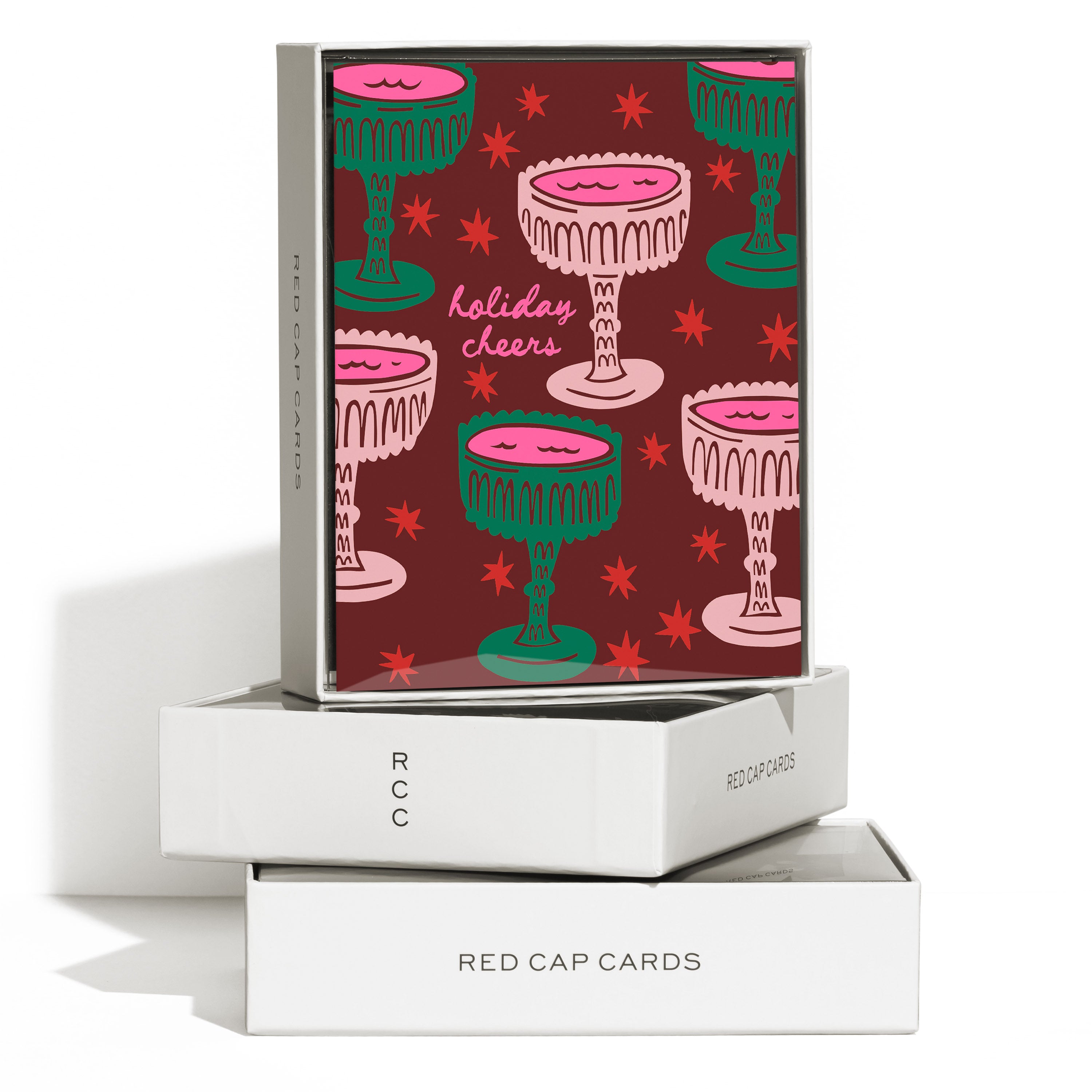 Set of 8 Greeting cards with illustrated vintage cocktail glasses with red starburst design and pink 'Holiday Cheers' text.
