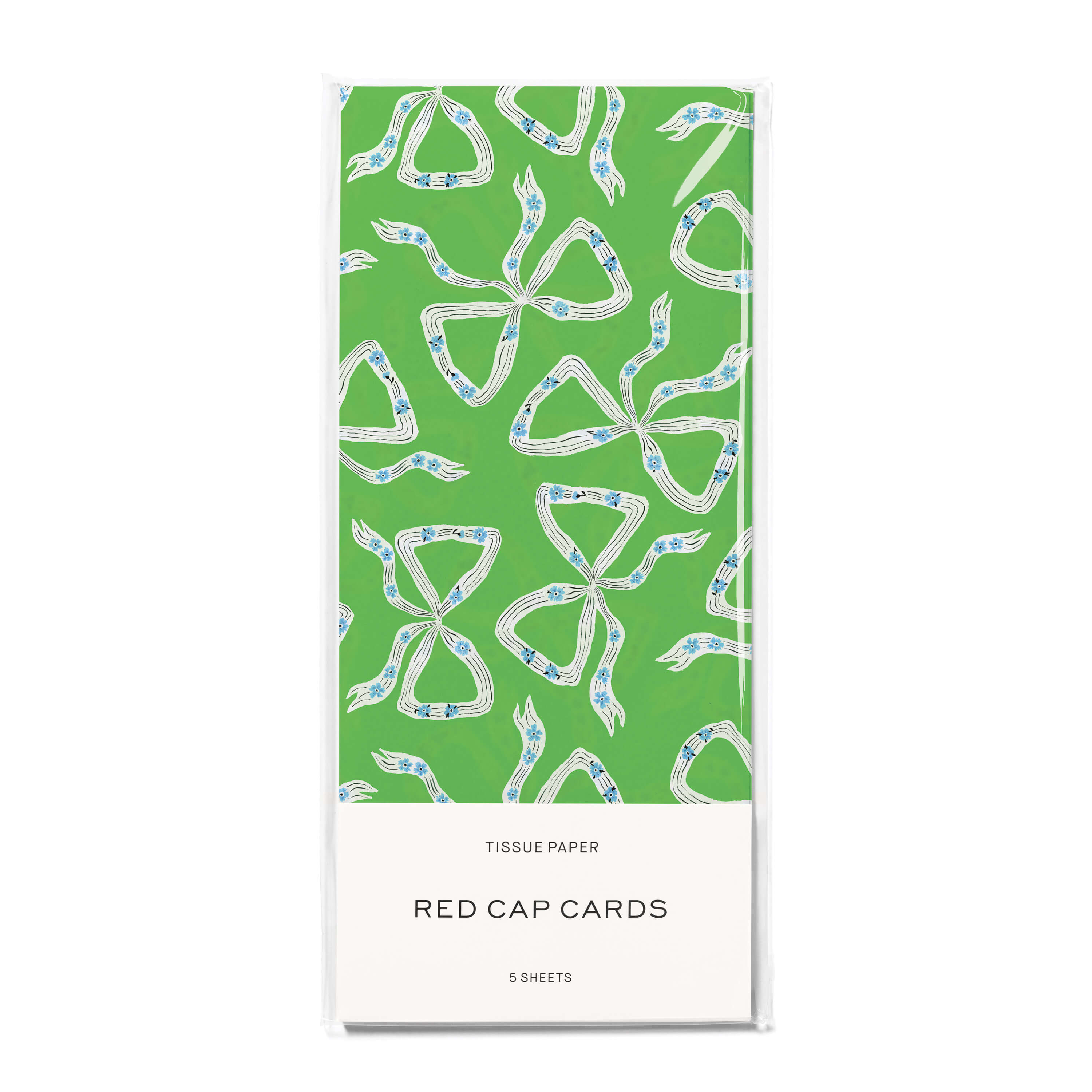 Green tissue paper with white and blue bow design on a white background.