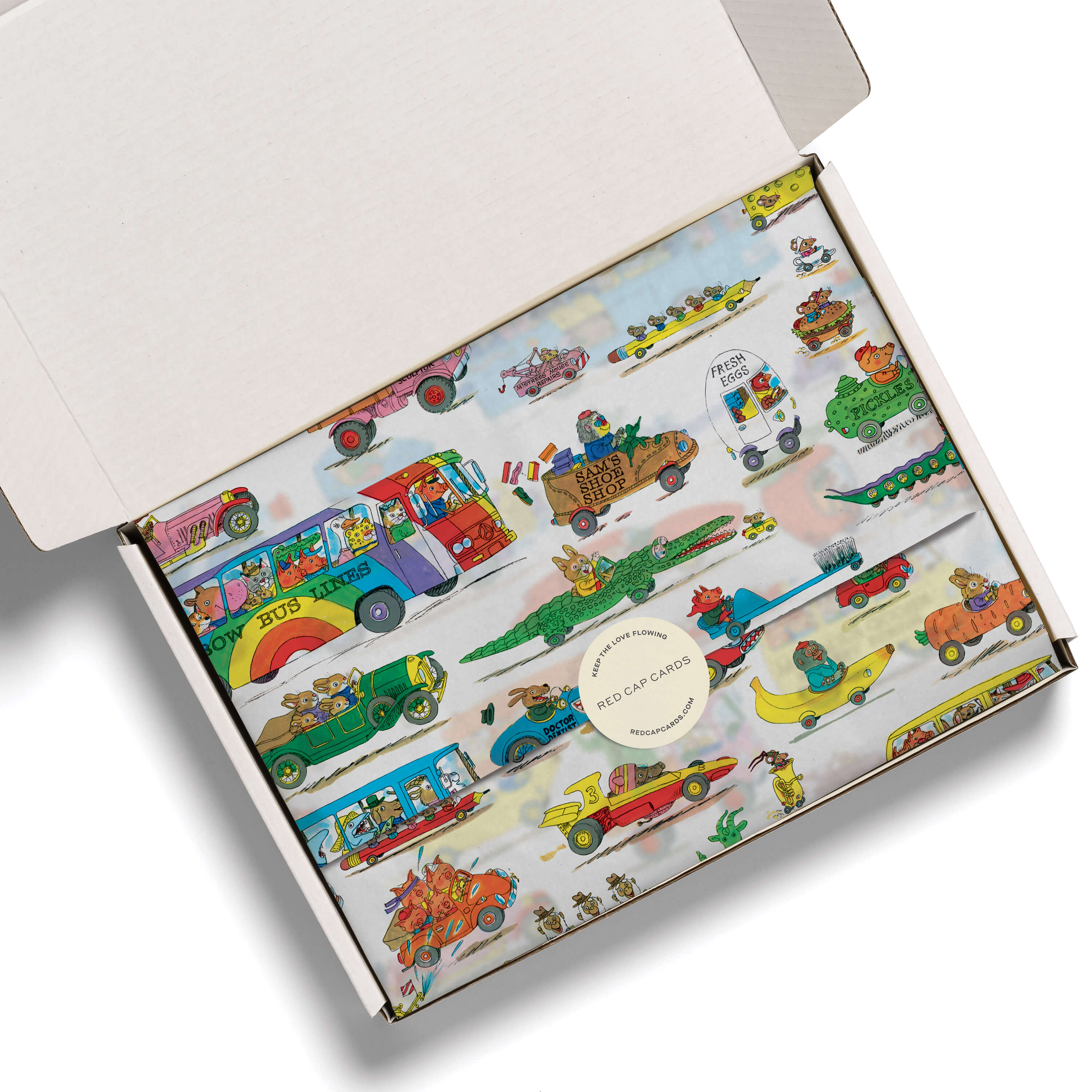Busytown Cars designed tissue paper in festive white box on a white background.
